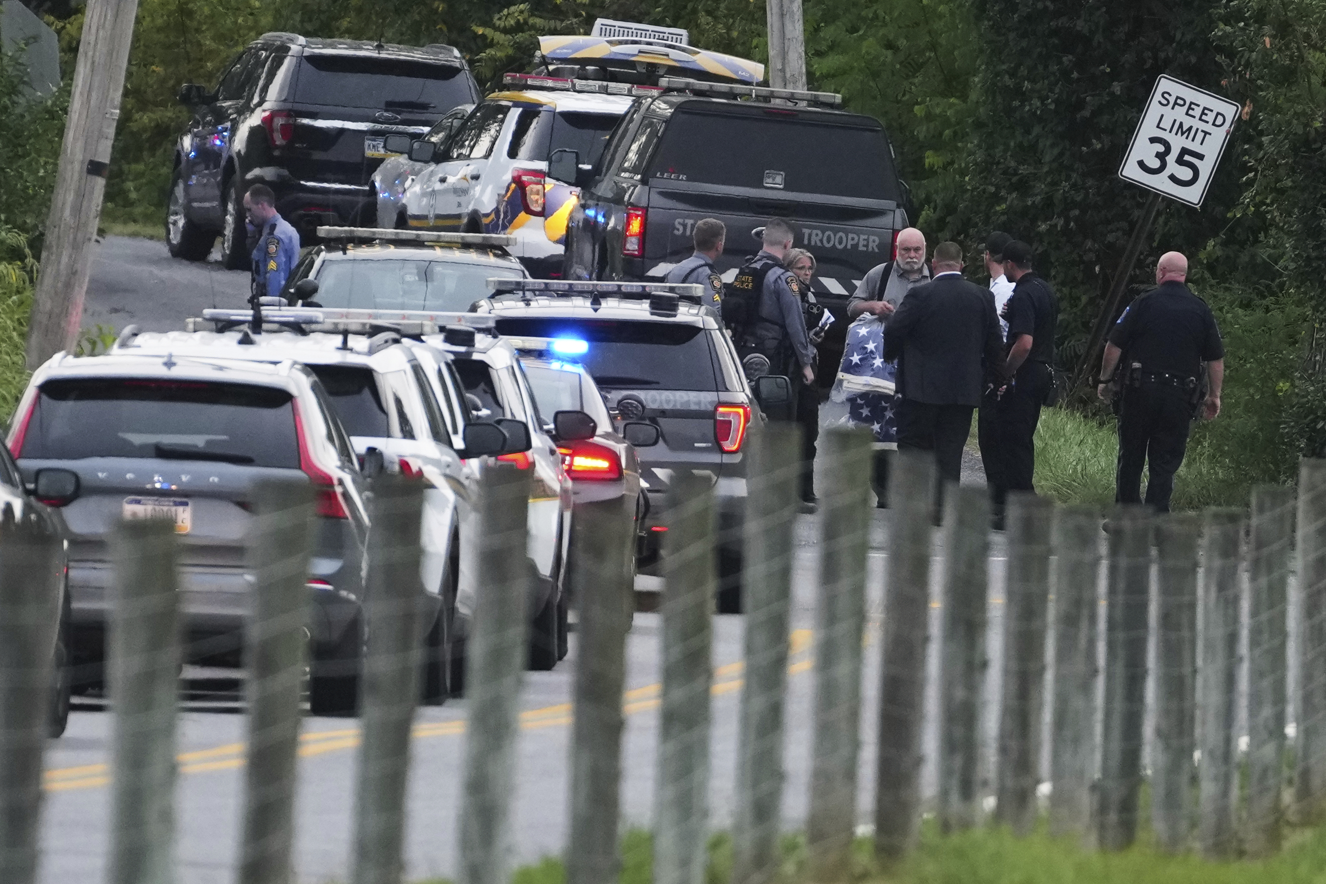 First responders work the scene after several people were injured during a shooting involving police officers on Wednesday, Sept. 17, 2025, in North Codorus, Pa. (AP Photo/Matt Slocum)