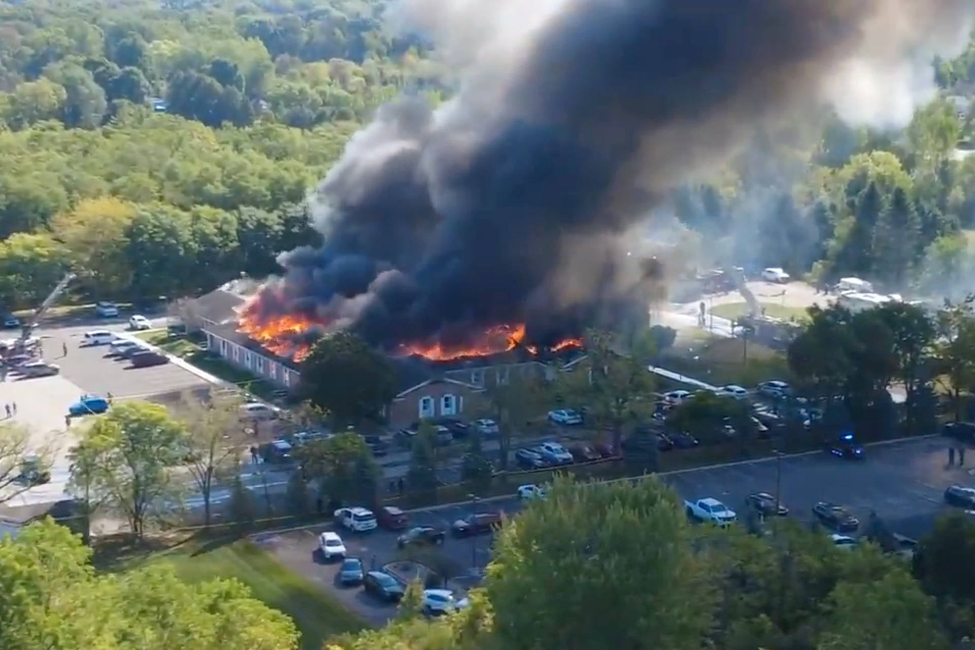Massive flames and smoke rise from The Church of Jesus Christ of Latter-day Saints in Grand Blanc