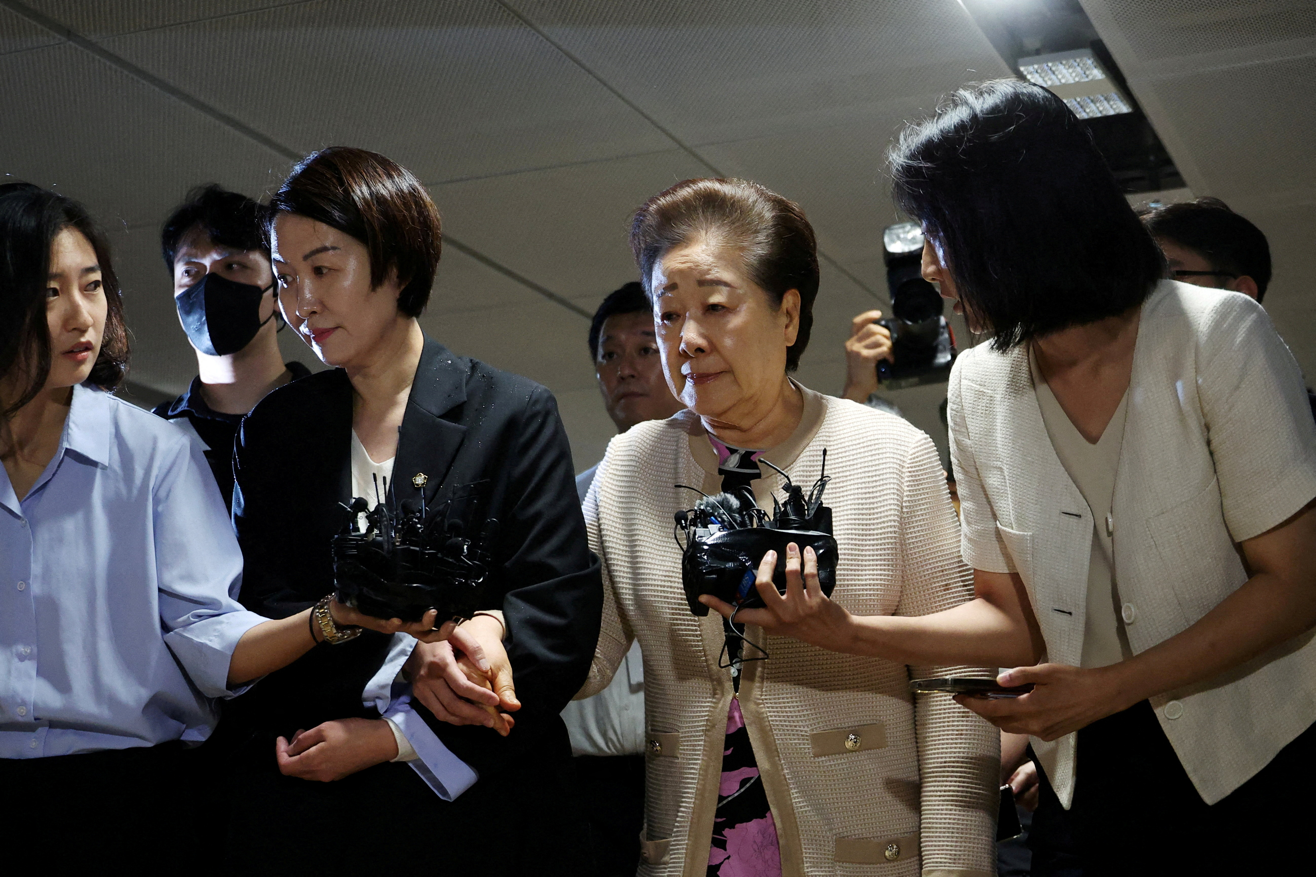 FILE PHOTO: Han Hak-ja, the leader of the Unification Church, arrives at the special prosecutors' office for questioning over allegations, which she has denied, that she instructed the church to bribe the wife of ousted President Yoon Suk Yeol and a politician close to Yoon, in Seoul, South Korea, September 17, 2025. REUTERS/Kim Hong-Ji/File Photo