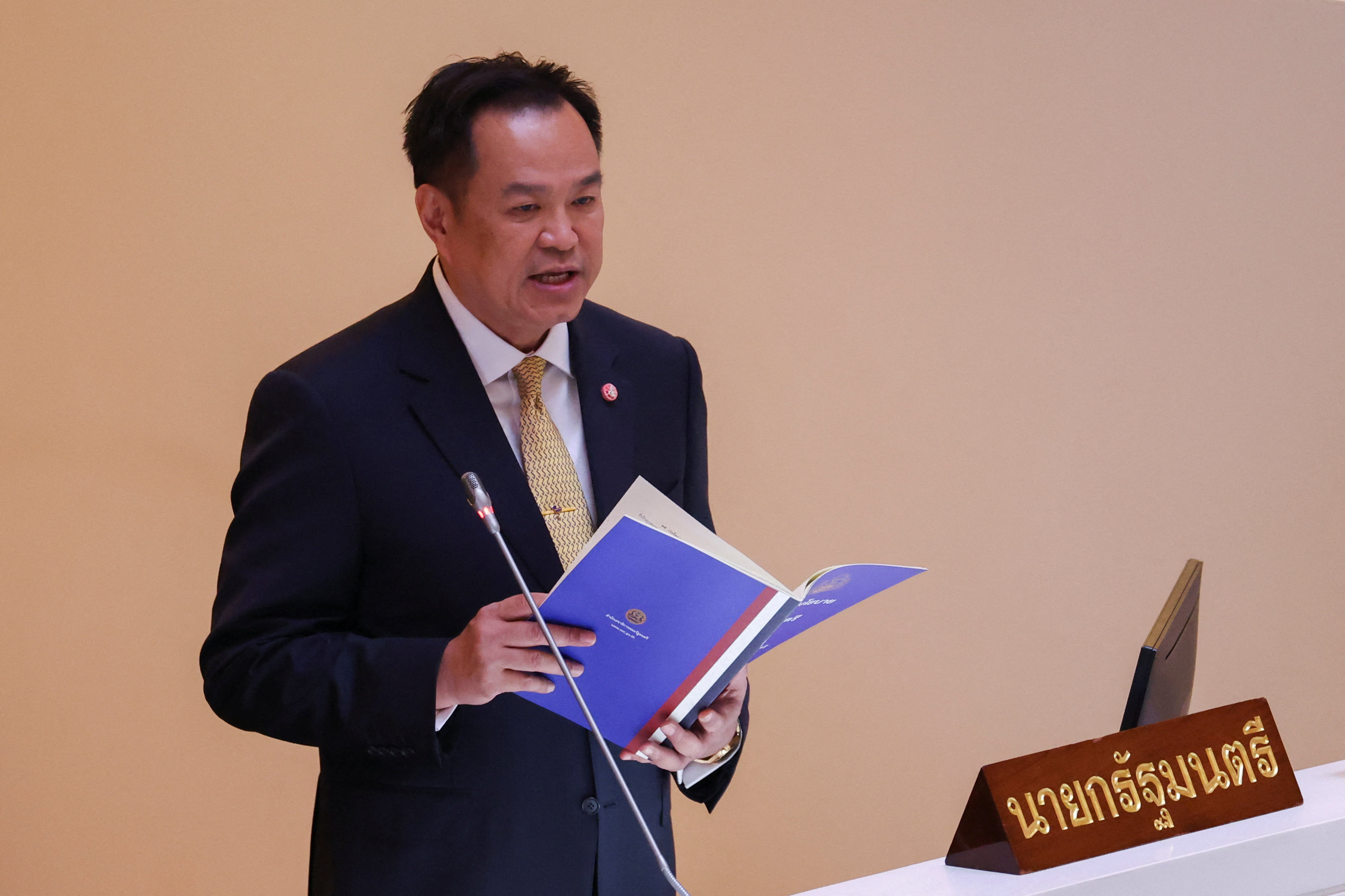 Thailand's Prime Minister Anutin Charnvirakul delivers the policy statements of the Council of Ministers to the parliament, at the parliament house, in Bangkok, Thailand, September 29, 2025. REUTERS/Chalinee Thirasupa REFILE - QUALITY REPEAT