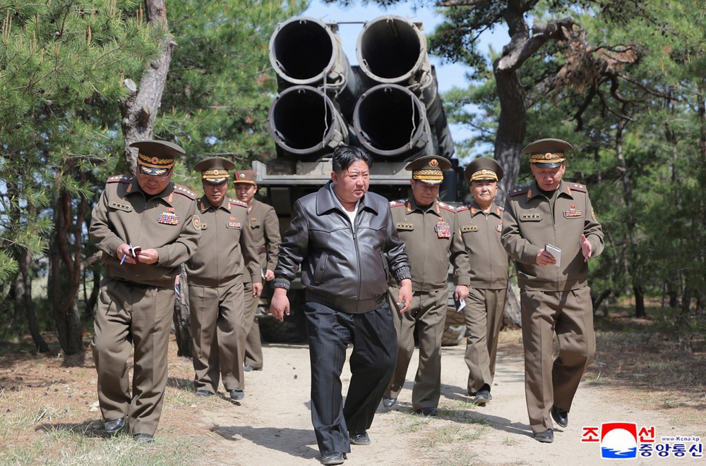 epa12085263 A photo released by the official North Korean Central News Agency (KCNA) shows North Korean leader Kim Jong Un (C) supervising a joint strike drill with long-range artillery and missile units at an undisclosed location in North Korea, 08 May 2025 (issued 09 May 2025). According to KCNA, the drill involved the 600 mm multiple launch rocket system and the Hwasongpho-11-Ka tactical ballistic missile. EPA/KCNA EDITORIAL USE ONLY