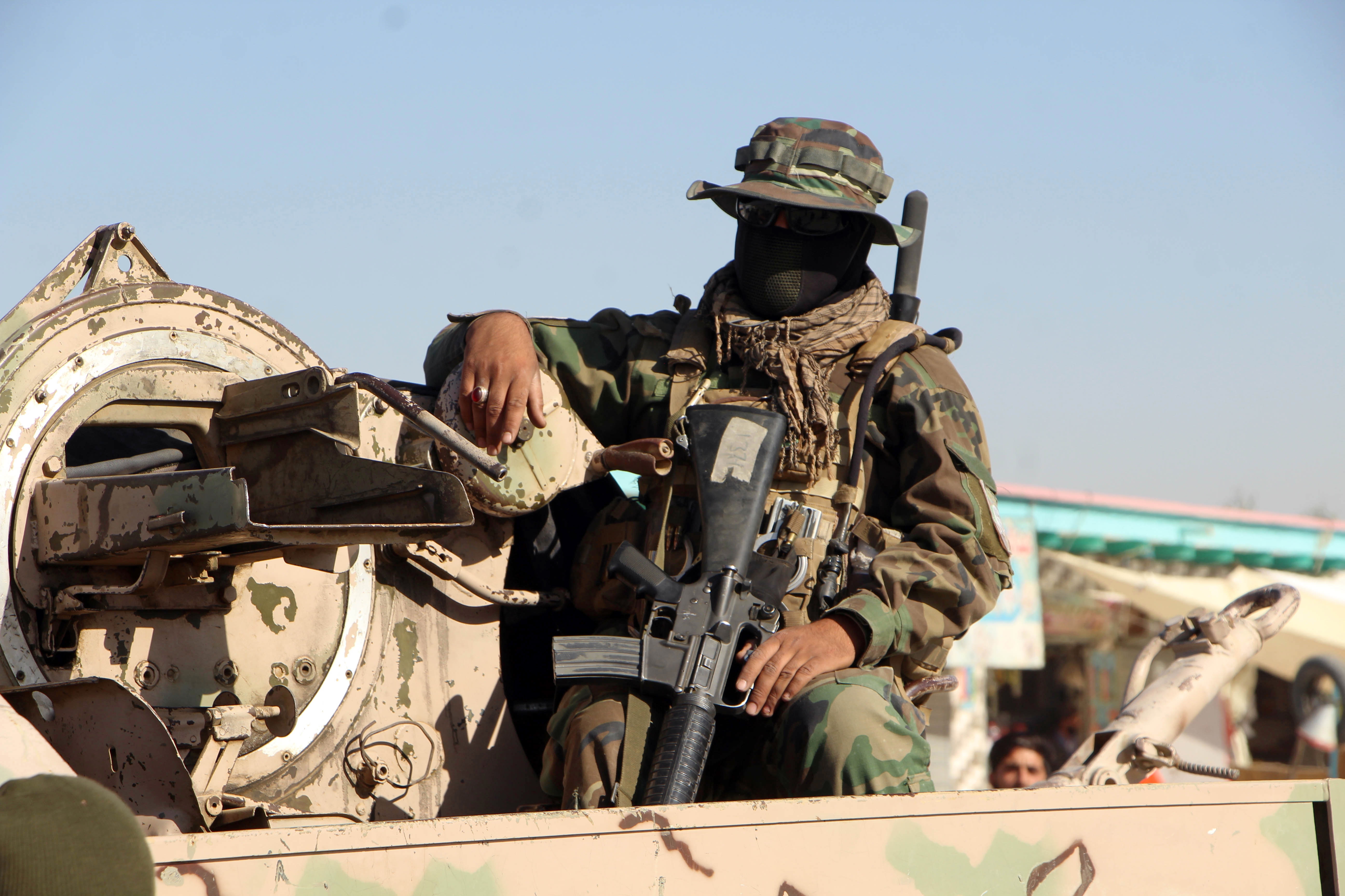 A Taliban security officer patrols along the de facto Pakistan-Afghan border in Spin Boldak, Kandahar