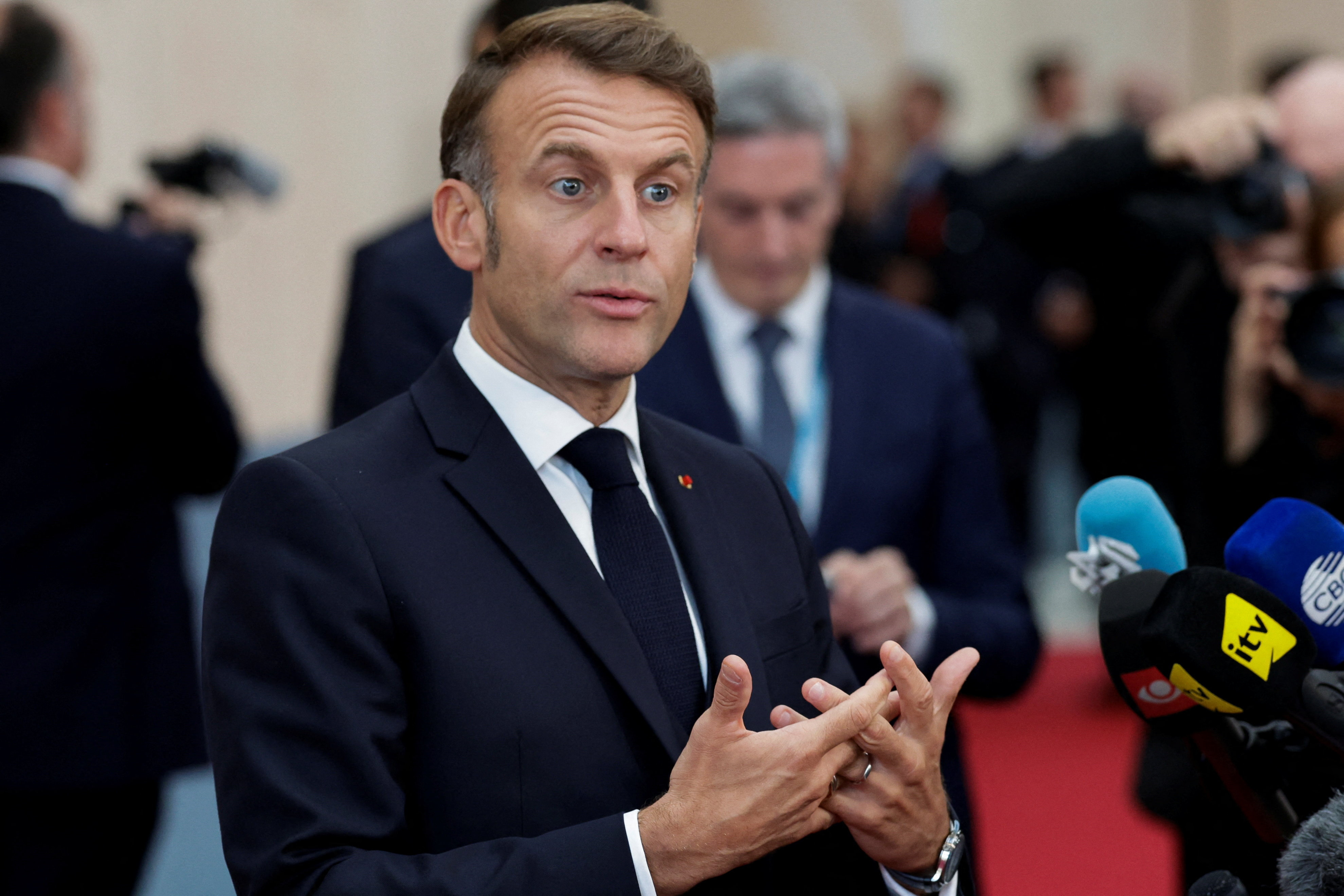President Emmanuel Macron speaks to members of the media at the EU summit in Copenhagen, Denmark, on October 2, 2025