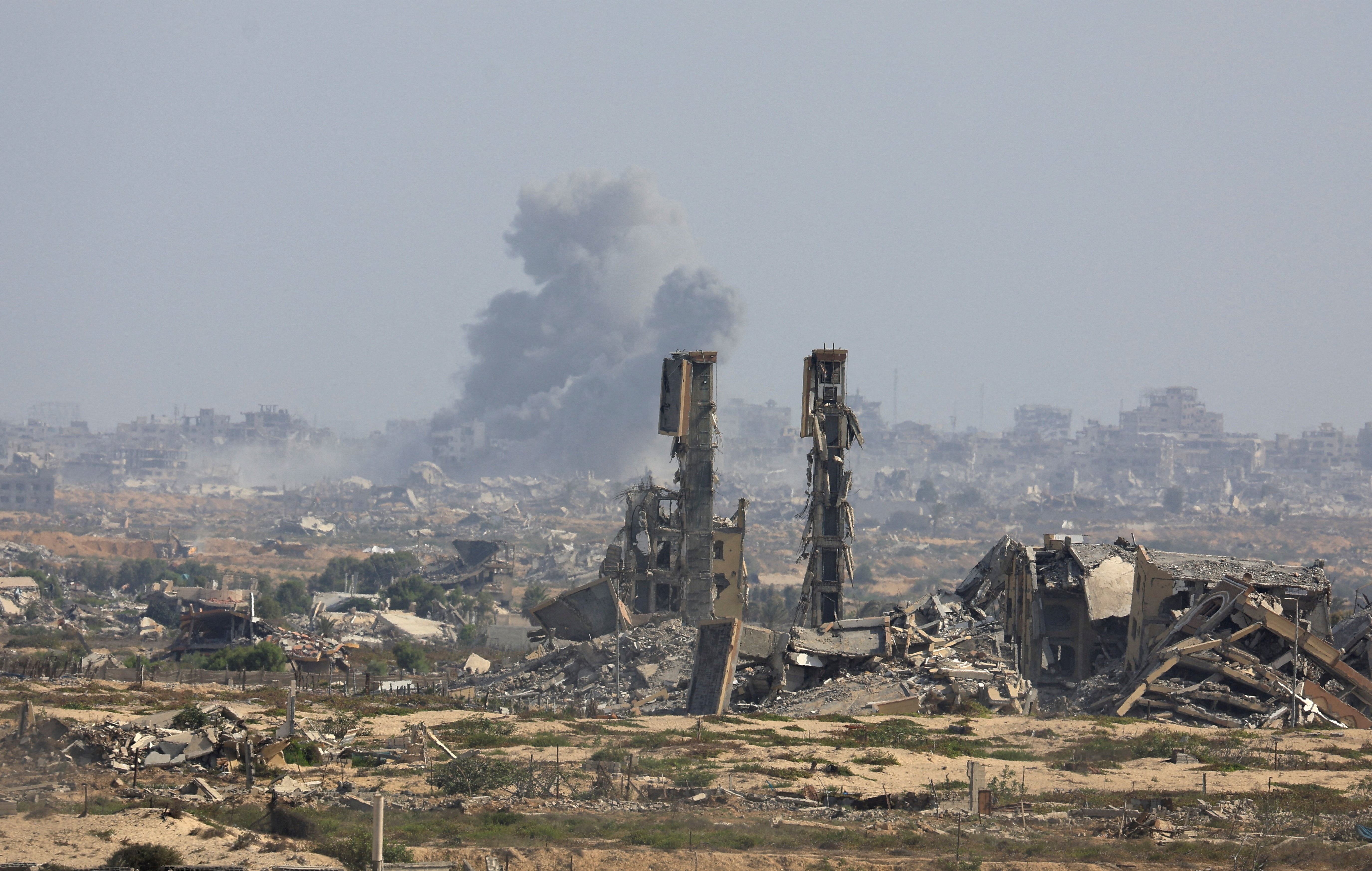Smoke rises following explosions in Gaza City.