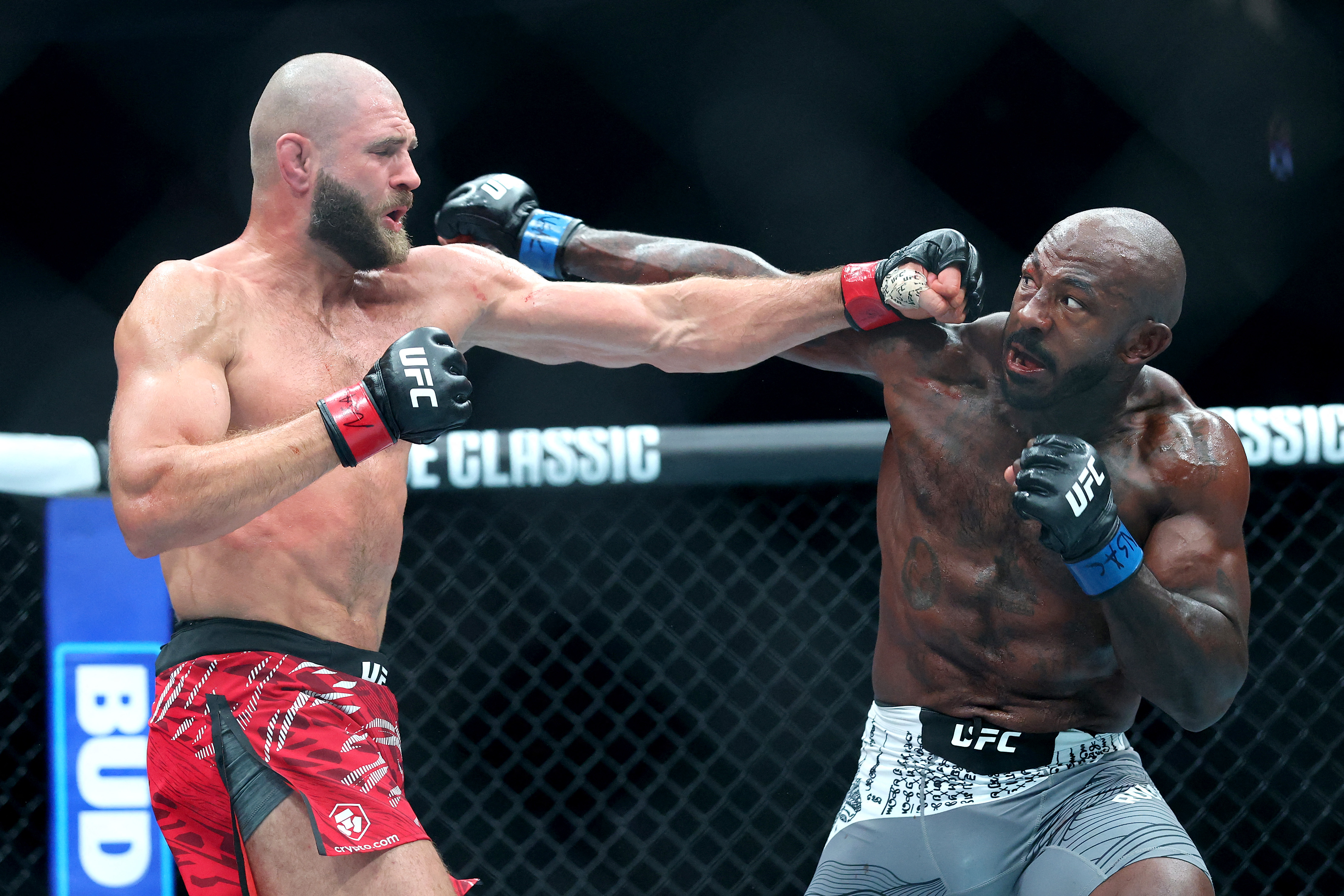 Jiri Prochazka, left, of the Czech Republic fights Khalil Rountree Jr. of the United States during a light heavyweight bout in UFC 320
