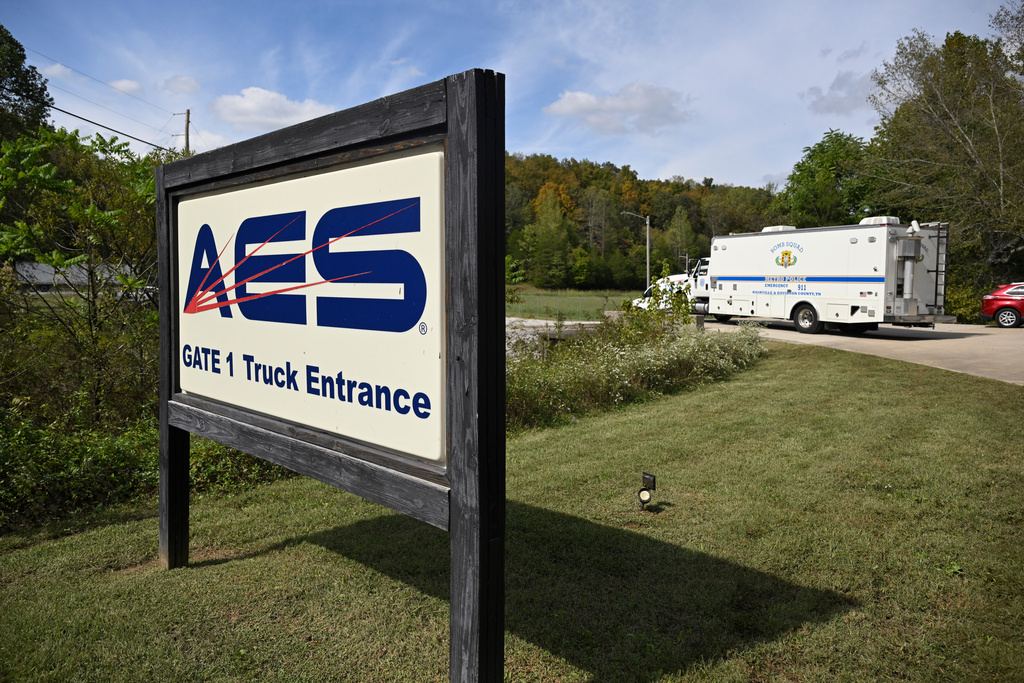 A bomb squad truck pulls into the Accurate Energetic Systems plant