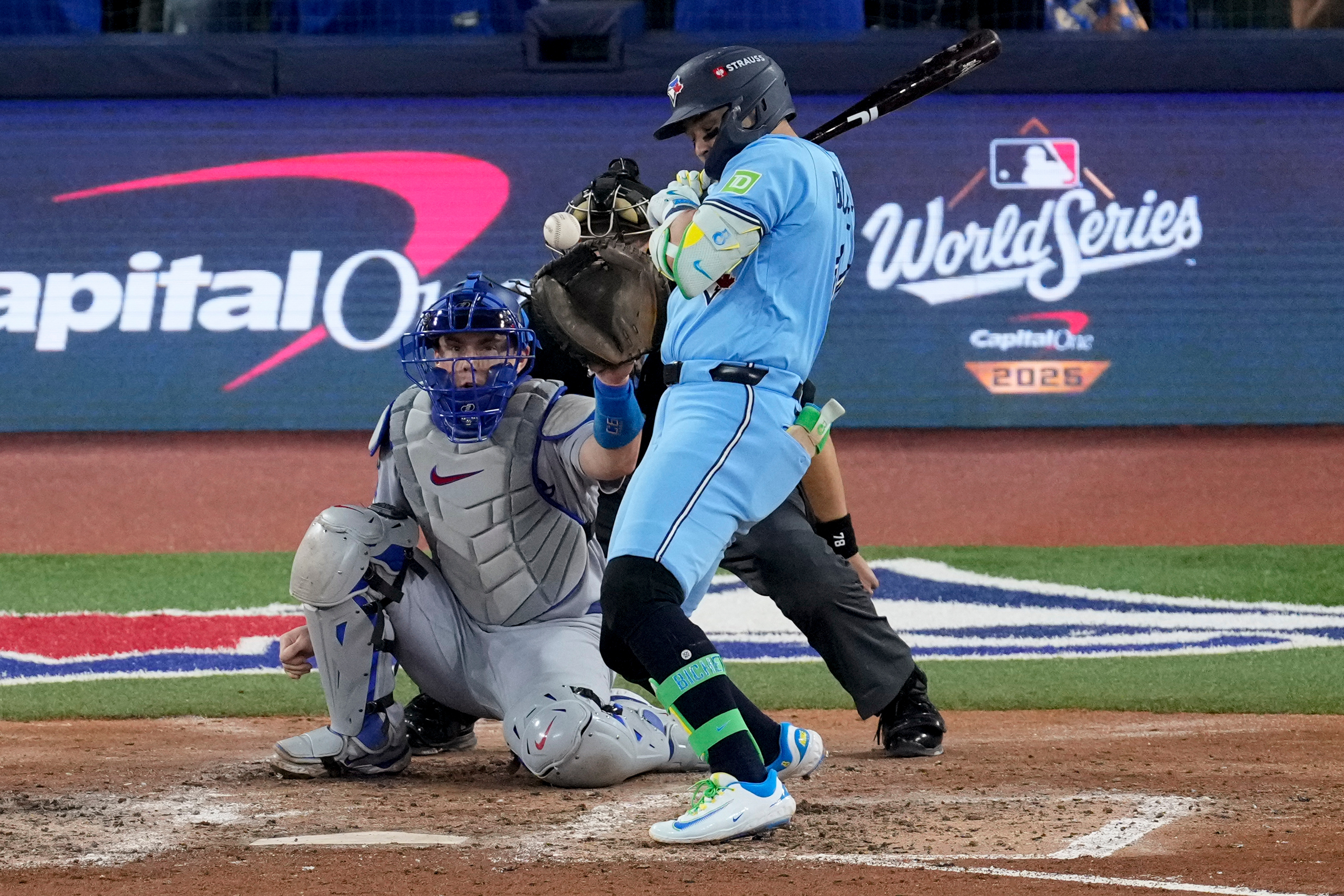 Toronto Blue Jays’ Bo Bichette is hit by a pitch by Los Angeles Dodgers’ pitcher Yoshinobu Yamamoto (not pictured) during the sixth inning in Game 6