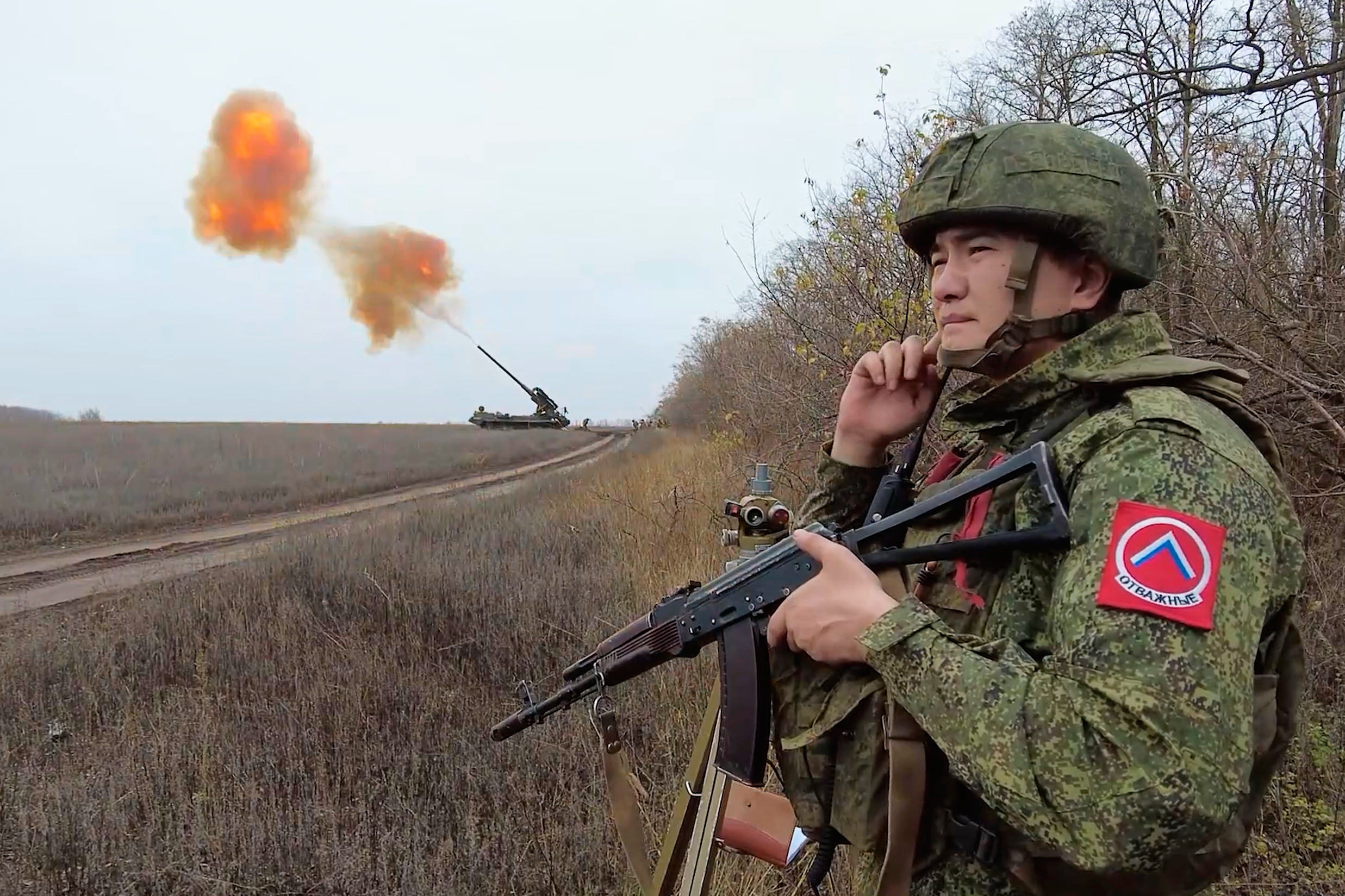 In this image made from a video provided by the Russian Defense Ministry Press Service on Friday, Nov. 28, 2025, a Malka self-propelled cannon fires towards Ukrainian positions in an undisclosed location in Ukraine. (Russian Defense Ministry Press Service via AP)