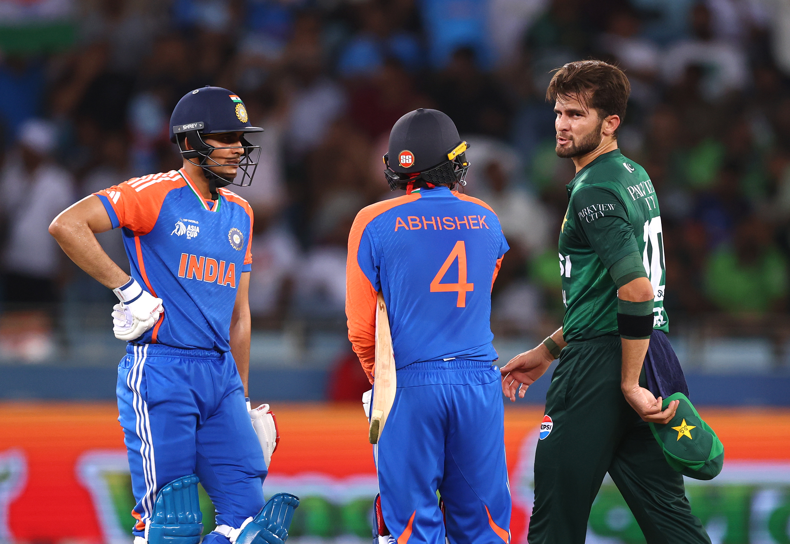 Shaheen Shah Afridi, Abhishek Sharma and Shubman Gill in action.