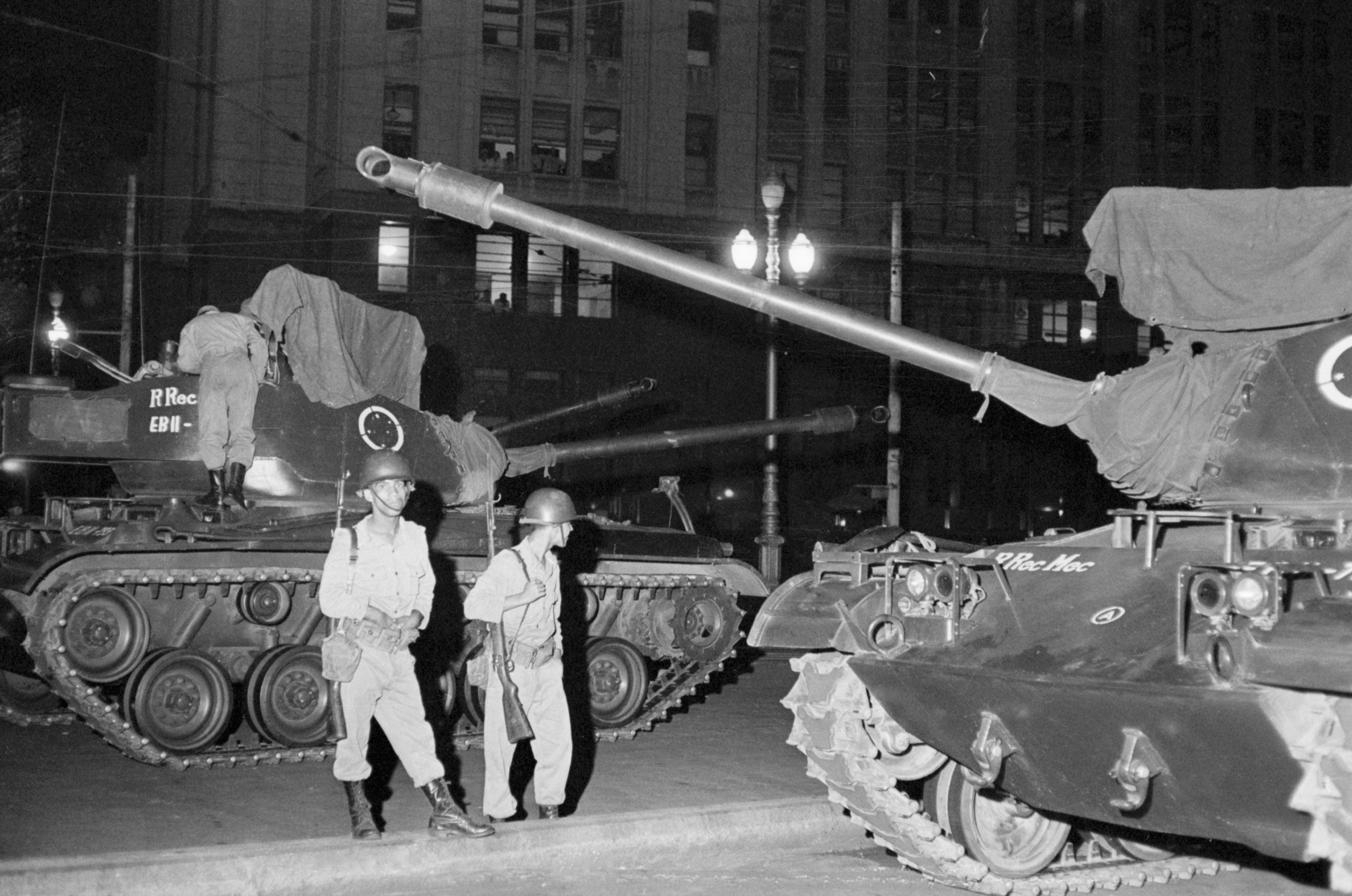 Troops guard the War Ministry in Rio de Janeiro, Brazil, through the night on April 1, 1964, as a rebellion against the left-leaning regime of President Joao Goulart begins