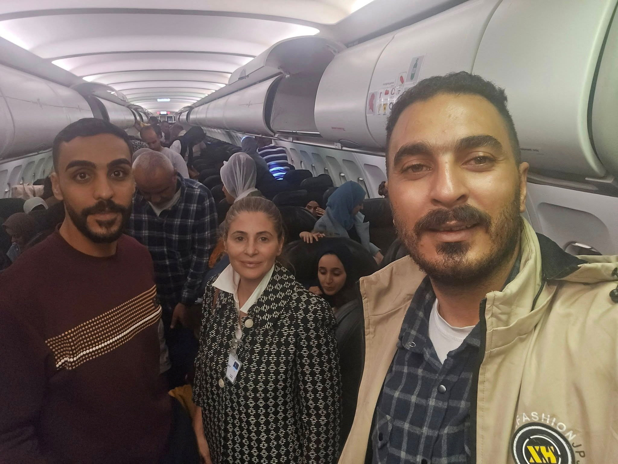 Hanan Jarrar, Palestinian ambassador to South Africa, smiles for a picture on a plane in a location given as given as Johannesburg, South Africa, in this handout image released on November 13, 2025. Embassy of the State of Palestine / South Africa via Facebook/Handout via REUTERS THIS IMAGE HAS BEEN SUPPLIED BY A THIRD PARTY. NO RESALES. NO ARCHIVES. MANDATORY CREDIT