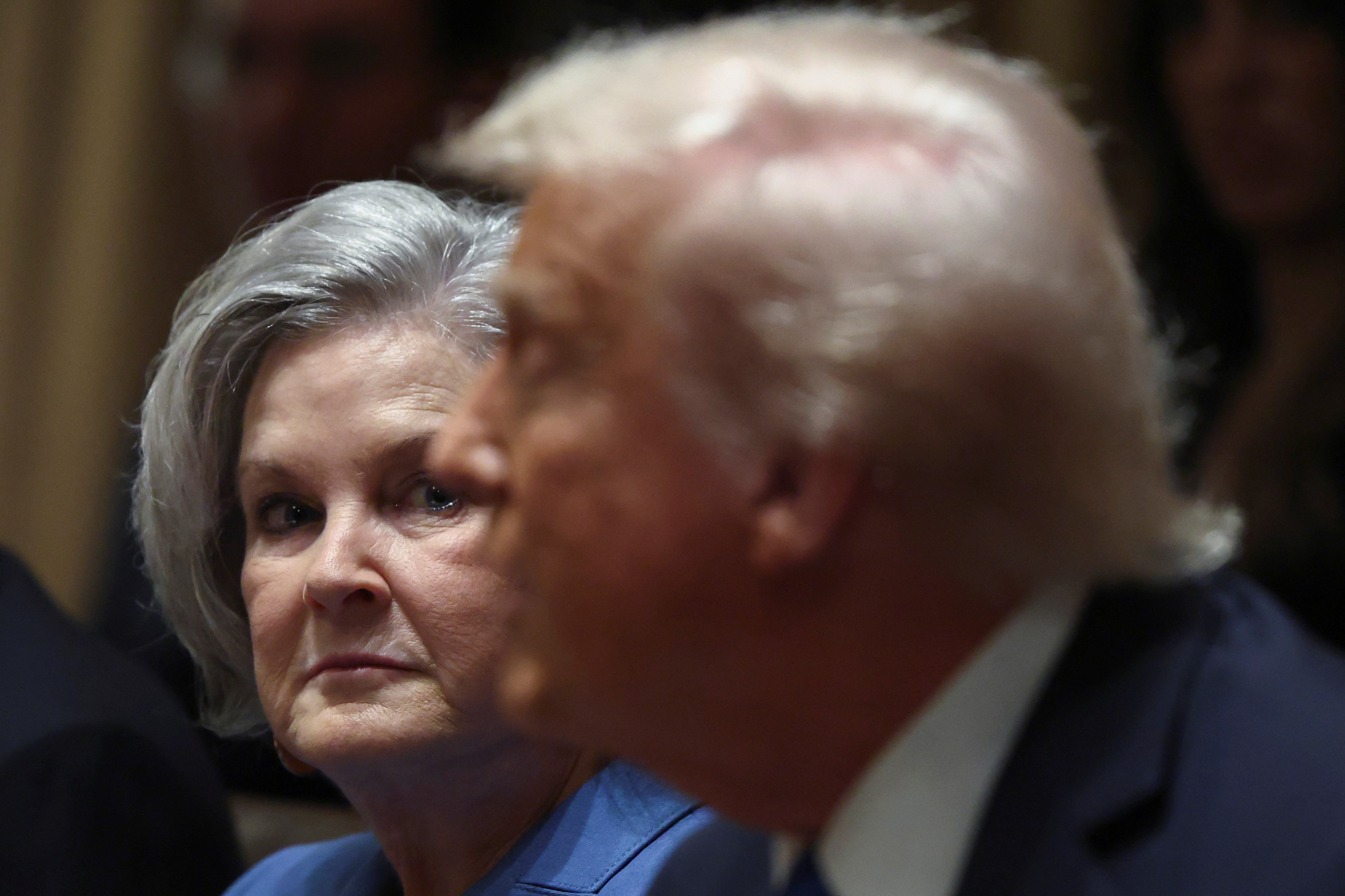 White House Chief of Staff Susie Wiles looks on as U.S. President Donald Trump speaks at the White House, in Washington, D.C., U.S., March 25, 2025. REUTERS/Evelyn Hockstein