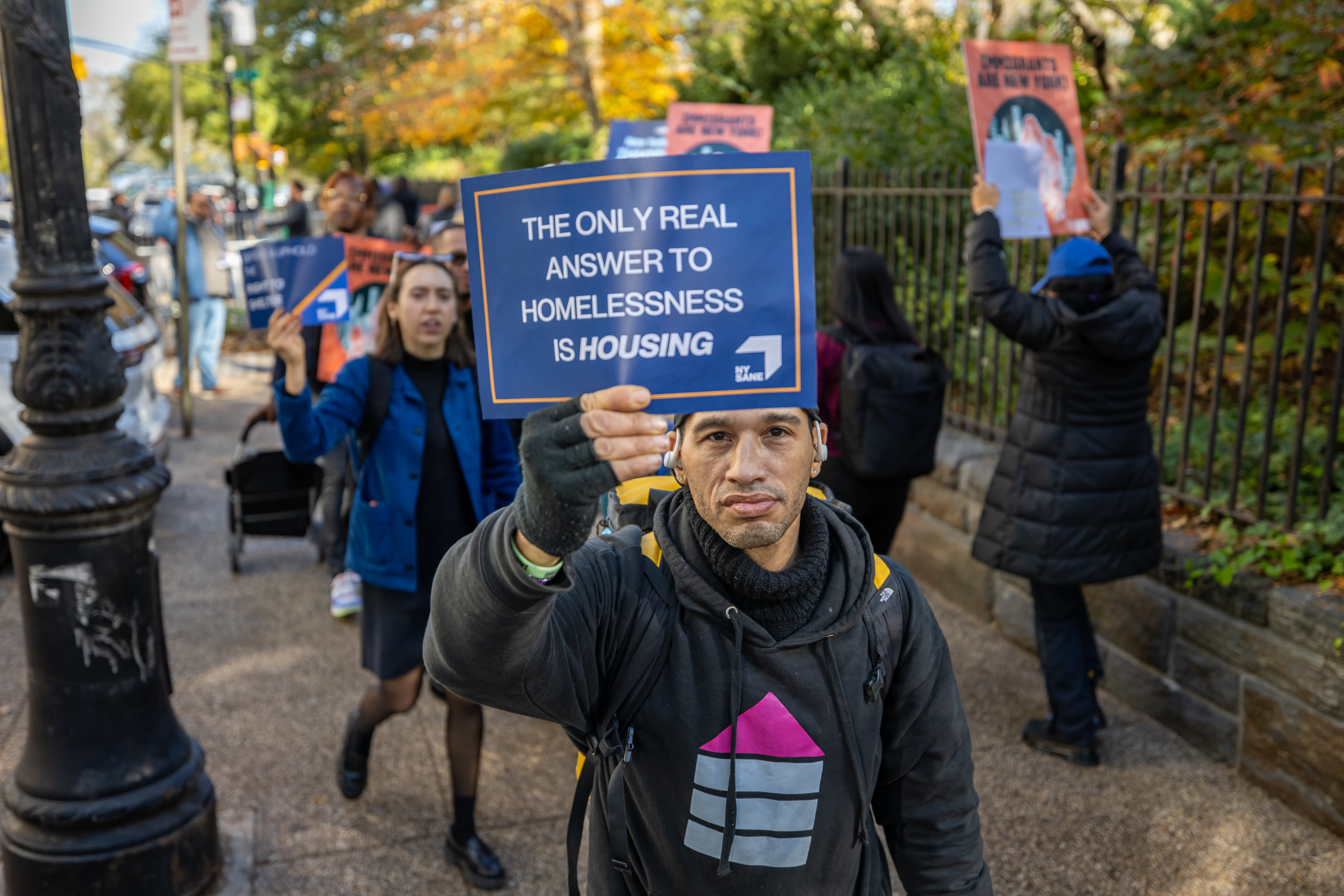 Protesters march during a rally and ‘sleep-in’ outside Gracie Mansion, New York City Mayor Eric Adams’s official residence, urging him to stop attacking the city’s right-to-shelter policy