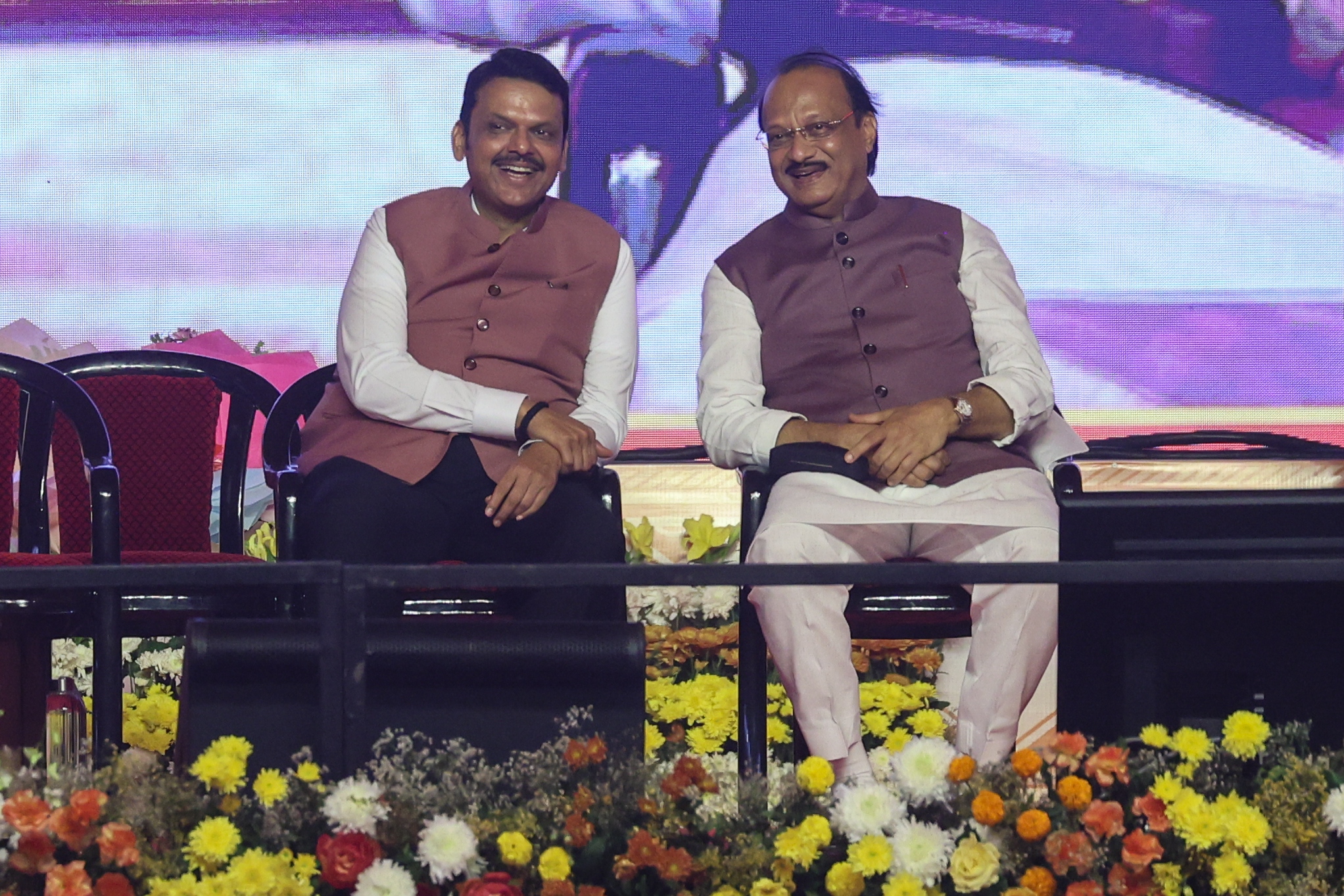 Ajit Pawar, right, with Maharashtra Chief Minister Devendra Fadnavis