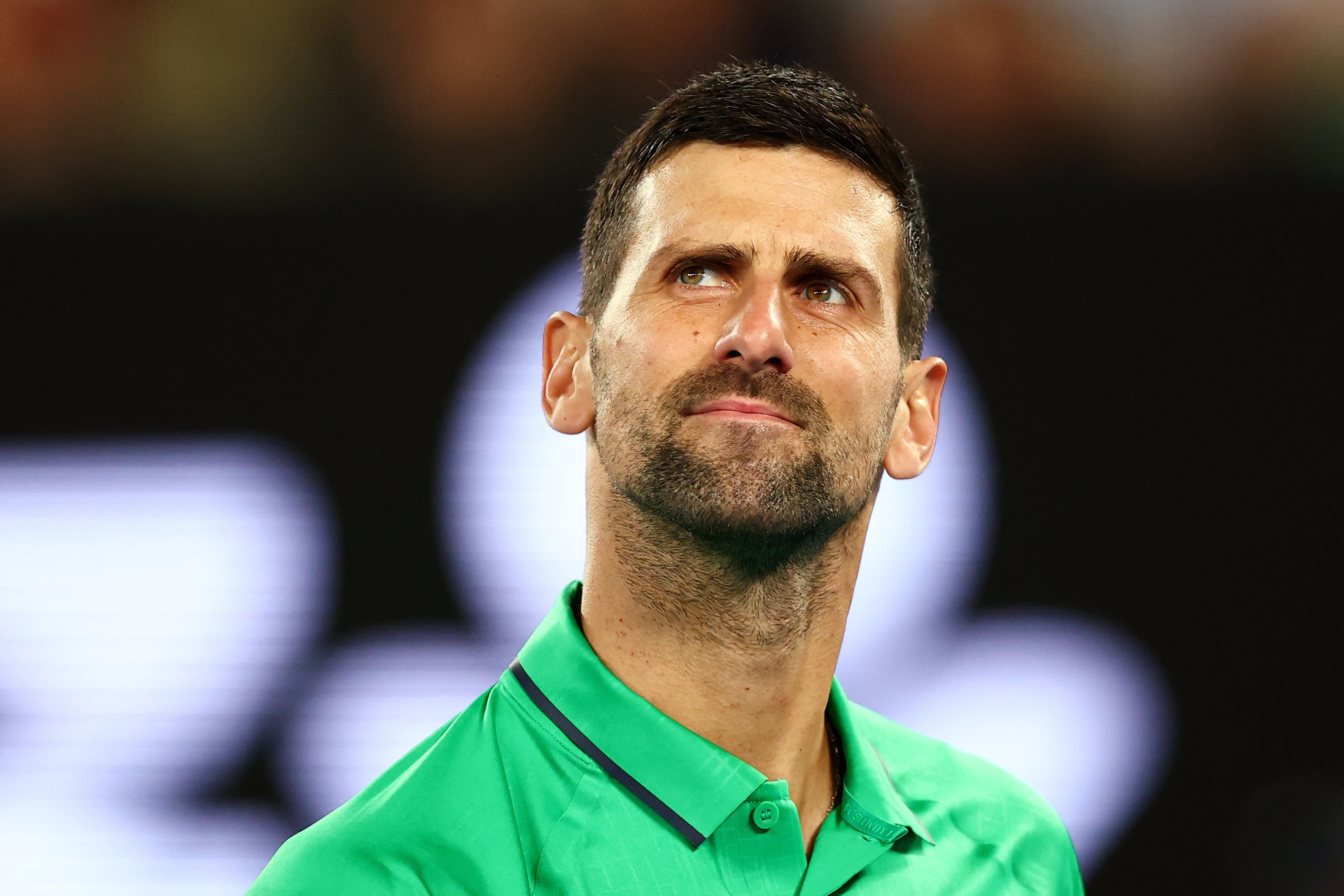 Novak Djokovic reacts.