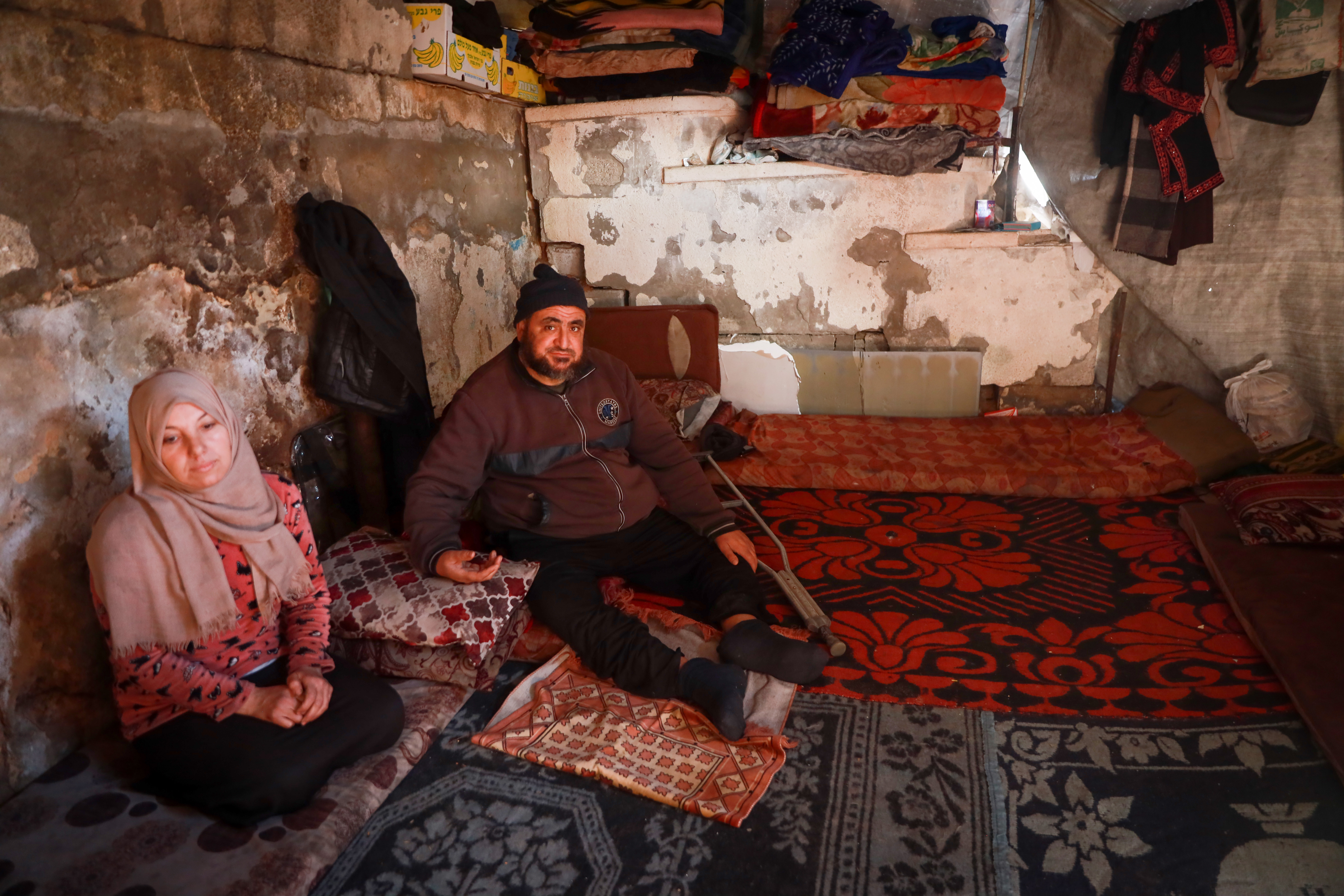 Asmaa Manoun and her husband, Mohammad, live under in a stairwell and are desperate for the situation in Gaza to improve