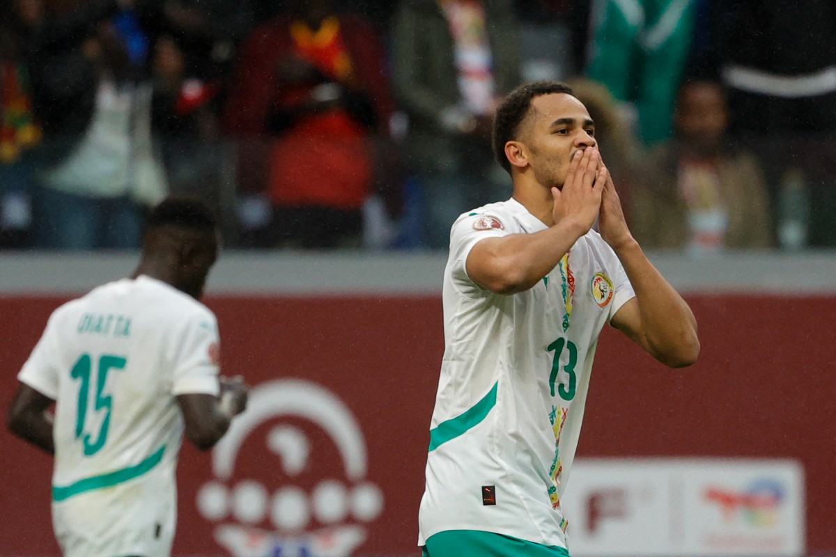 Senegal's forward Iliman Ndiaye celebrates scoring his team's first goal during the Africa Cup of Nations (CAN) quarter-final football match between Mali and Senegal