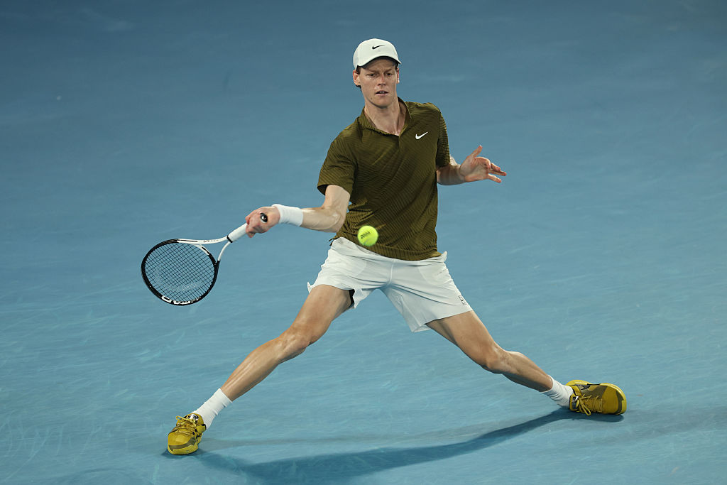 Jannik Sinner of Italy plays a forehand in the Men’s Singles semifinal at Melbourne Park