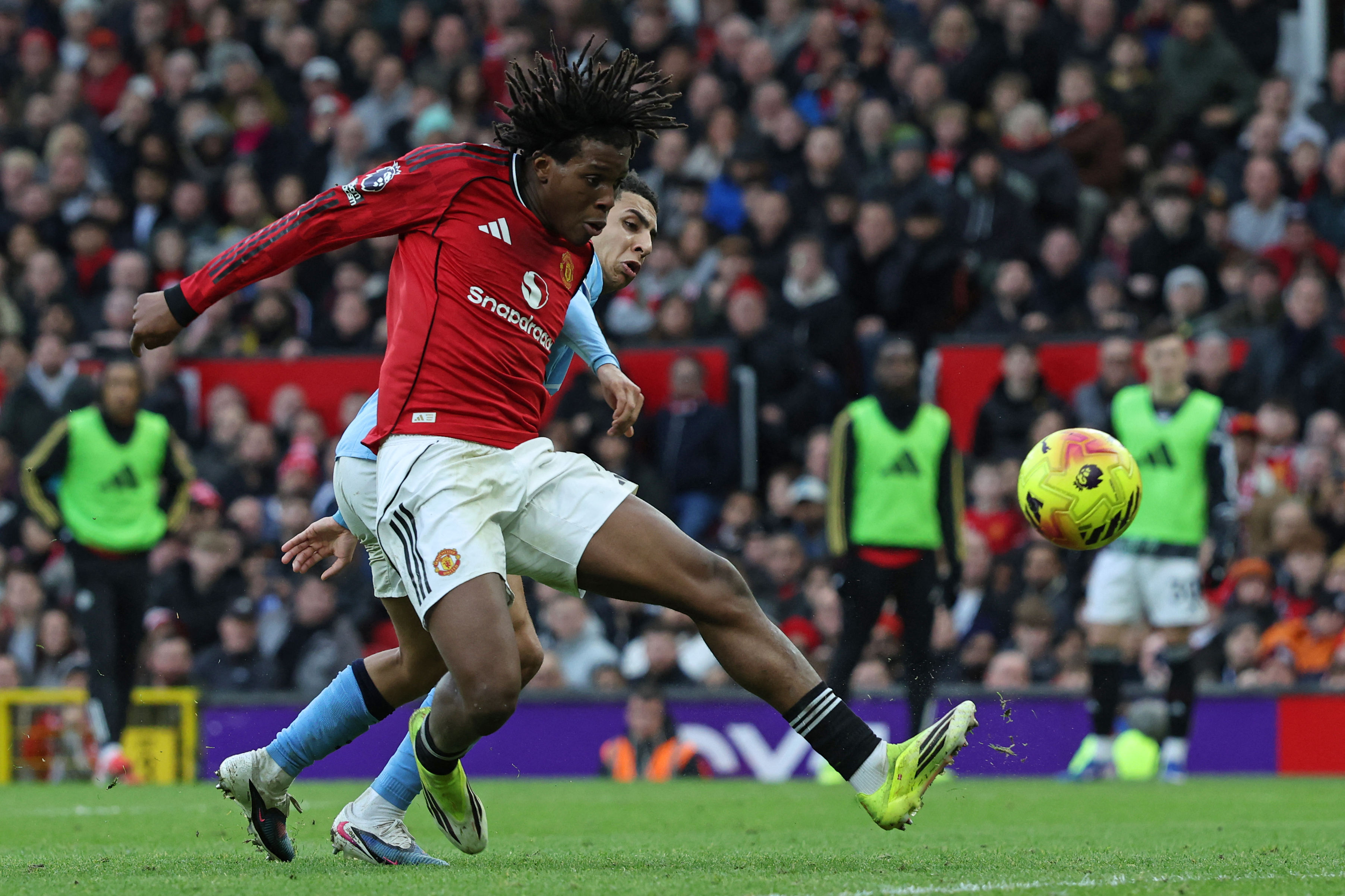 Manchester United's Danish defender #13 Patrick Dorgu shoots to score their second goal during the English Premier League football match between Manchester United and Manchester City at Old Trafford in Manchester, north west England, on January 17, 2026. (Photo by Darren Staples / AFP) / RESTRICTED TO EDITORIAL USE. NO USE WITH UNAUTHORIZED AUDIO, VIDEO, DATA, FIXTURE LISTS, CLUB/LEAGUE LOGOS OR 'LIVE' SERVICES. ONLINE IN-MATCH USE LIMITED TO 120 IMAGES. AN ADDITIONAL 40 IMAGES MAY BE USED IN EXTRA TIME. NO VIDEO EMULATION. SOCIAL MEDIA IN-MATCH USE LIMITED TO 120 IMAGES. AN ADDITIONAL 40 IMAGES MAY BE USED IN EXTRA TIME. NO USE IN BETTING PUBLICATIONS, GAMES OR SINGLE CLUB/LEAGUE/PLAYER PUBLICATIONS.