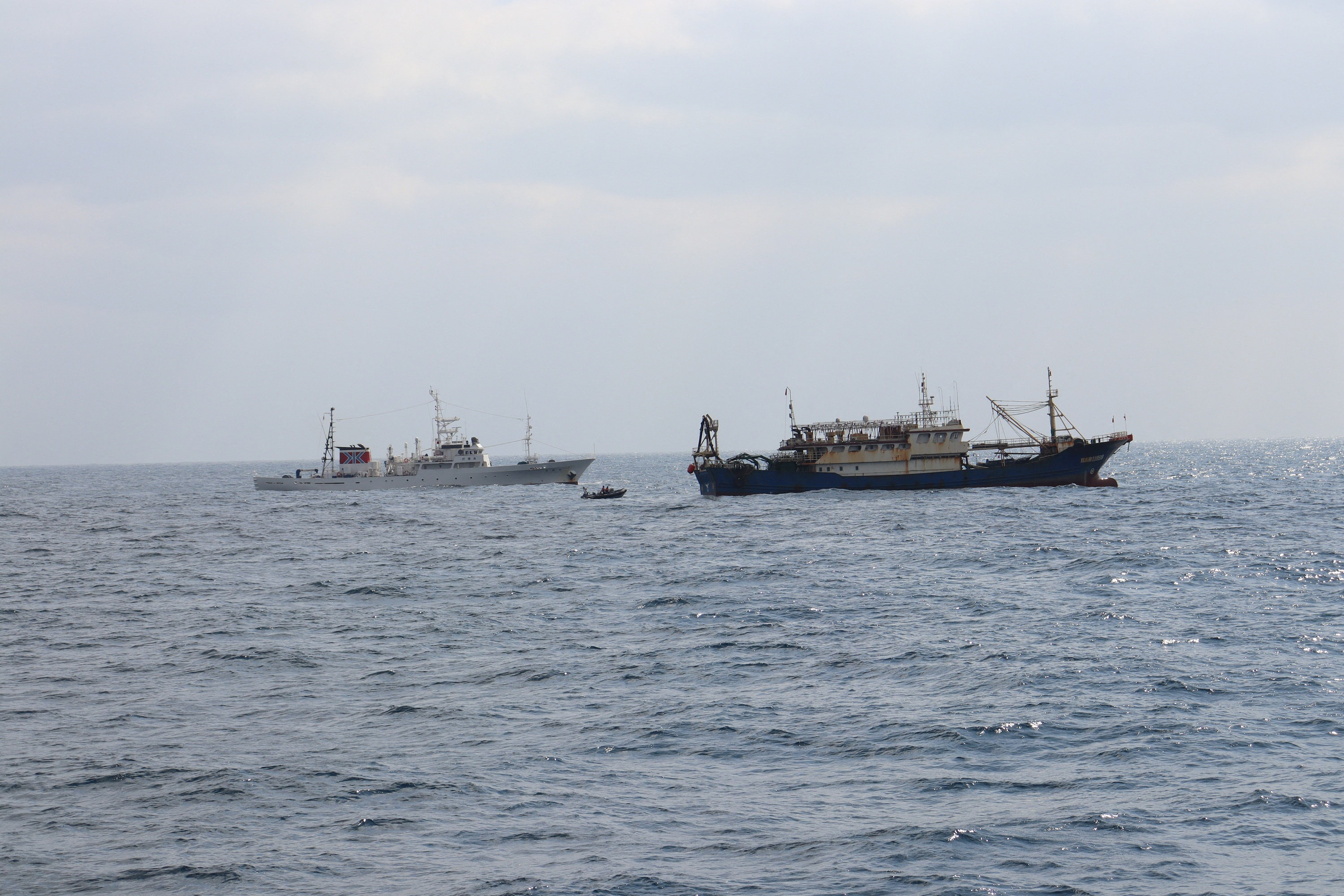 Japan's Fisheries Agency patrol vessel "Hakuo Maru" and Chinese fishing vessel "Qiong Dong Yu 11998" in waters off southwest Nagasaki Prefecture, Japan, February 12, 2026, in this handout photo provided by the Fisheries Agency of Japan. Fisheries Agency of Japan/Handout via REUTERS ATTENTION EDITORS - THIS IMAGE HAS BEEN SUPPLIED BY A THIRD PARTY. MANDATORY CREDIT.