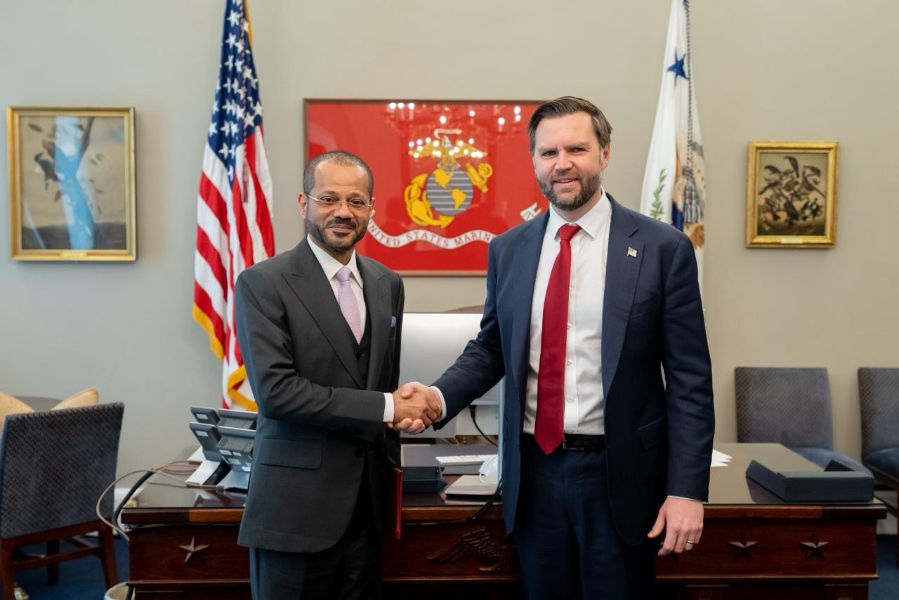 Oman's foreign minister Badr Albusaidi shaking hands with US Vice President JD Vance.