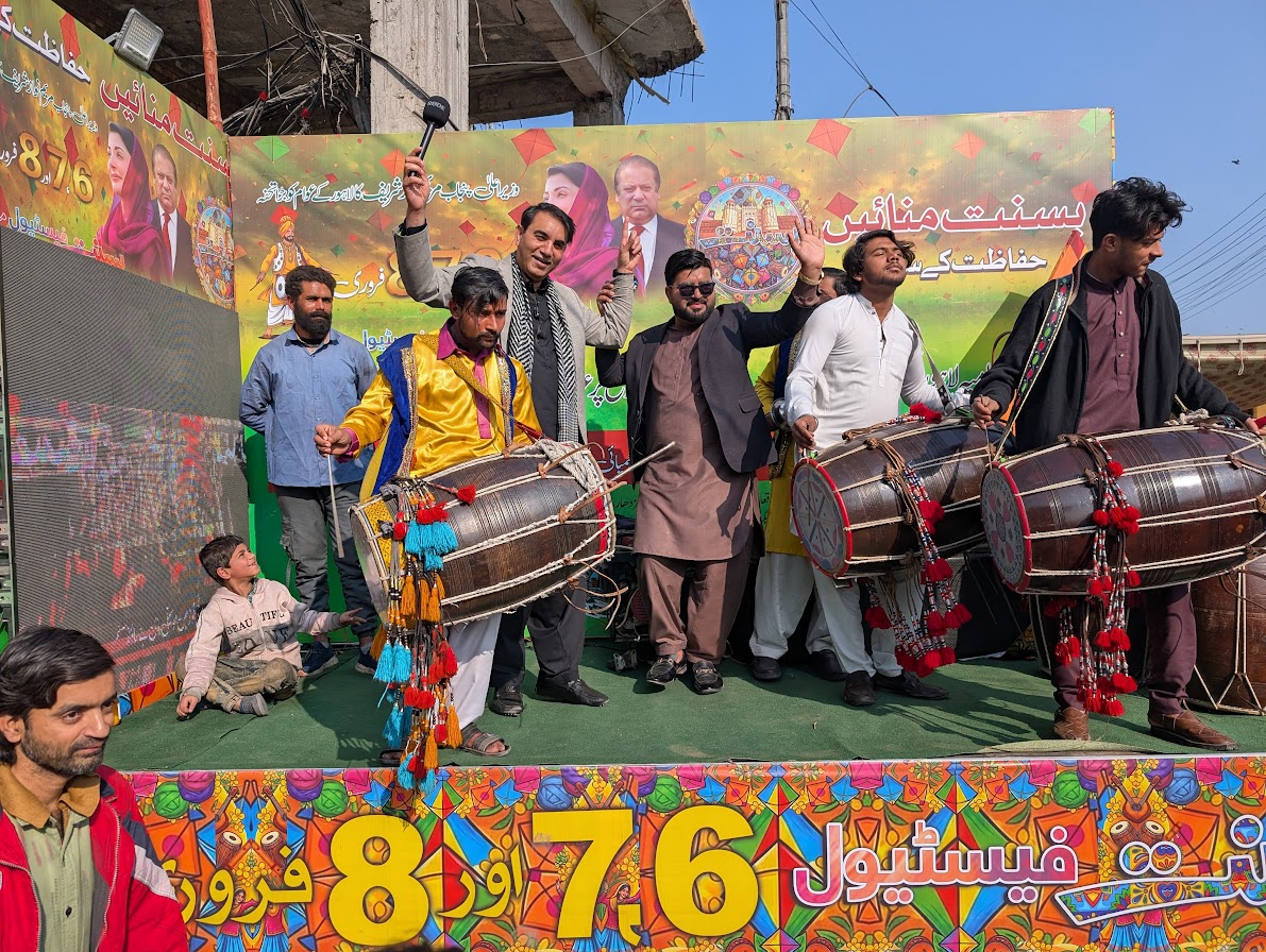 As buyers thronged the Mochi Gate market, musicians kept the crowd entertained by playing dhol drums and dancing