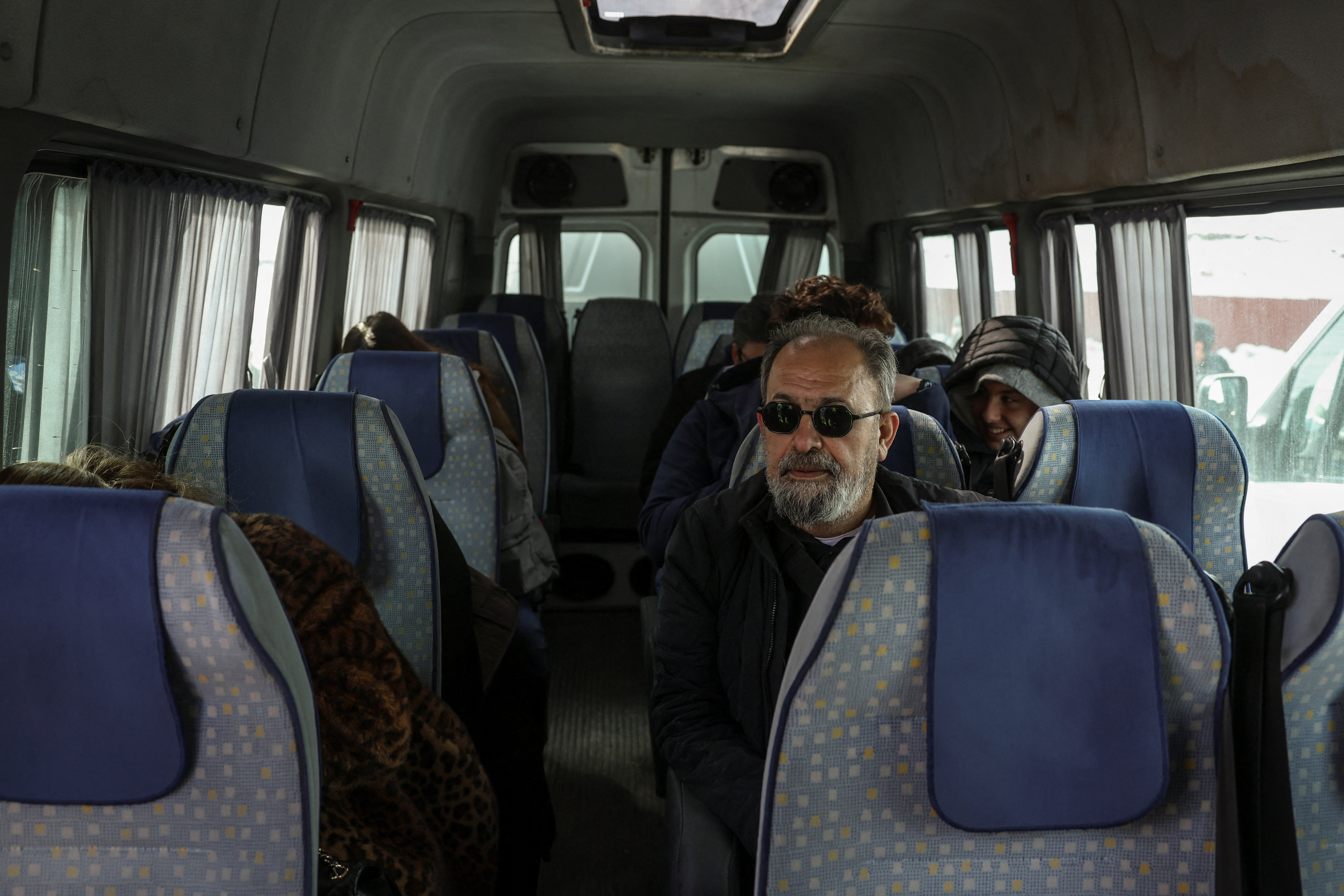 Iranians make their way after crossing into Turkey at the Kapikoy Border Gate in the eastern Van province