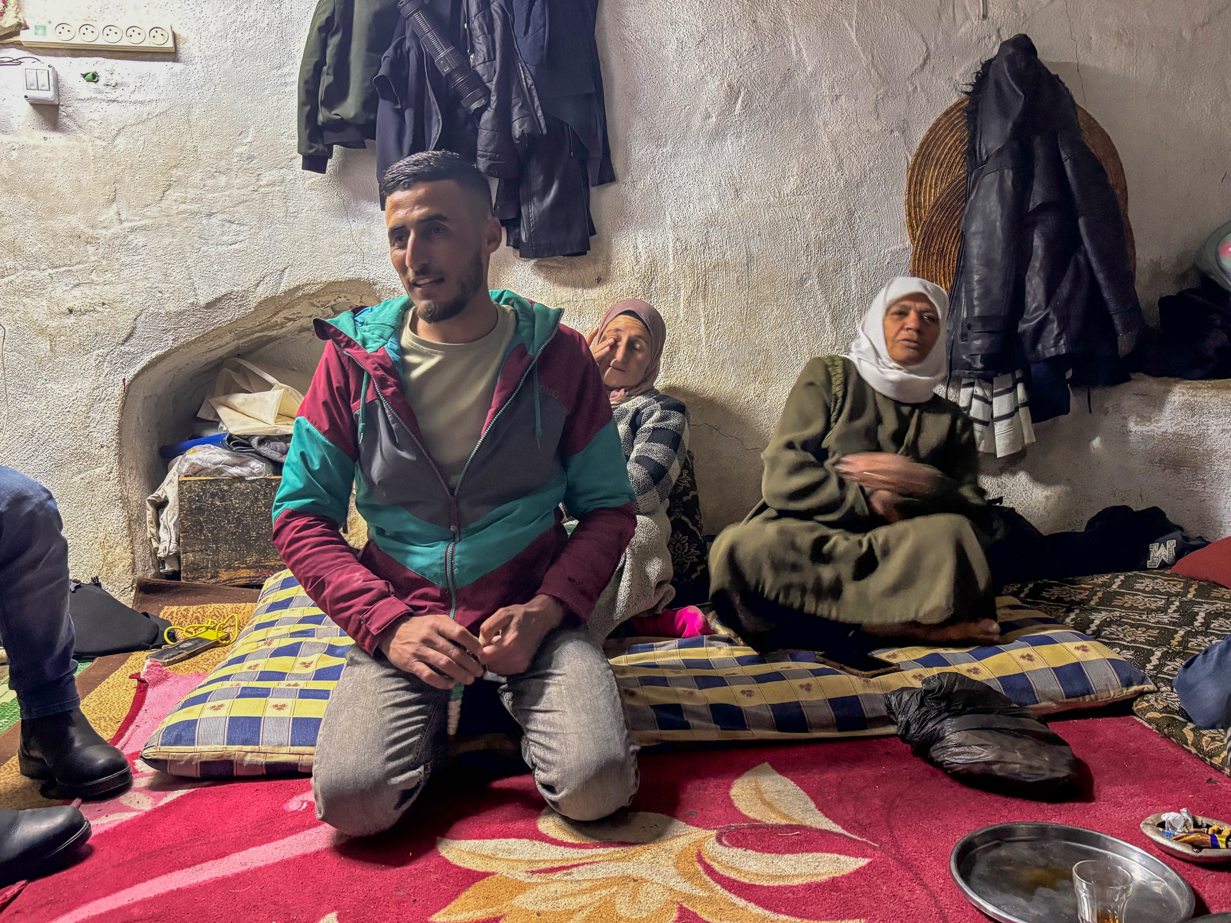 Thabet, Maysoon and Hajja inside the family den