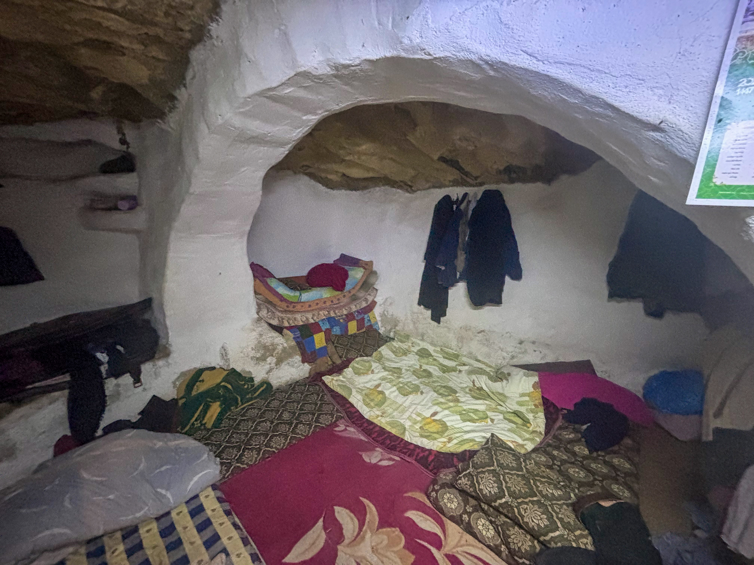 Mattresses spread across the floor beneath the stone dome of the Masallam family home in Khirbet al-Marajim [Al Jazeera]
