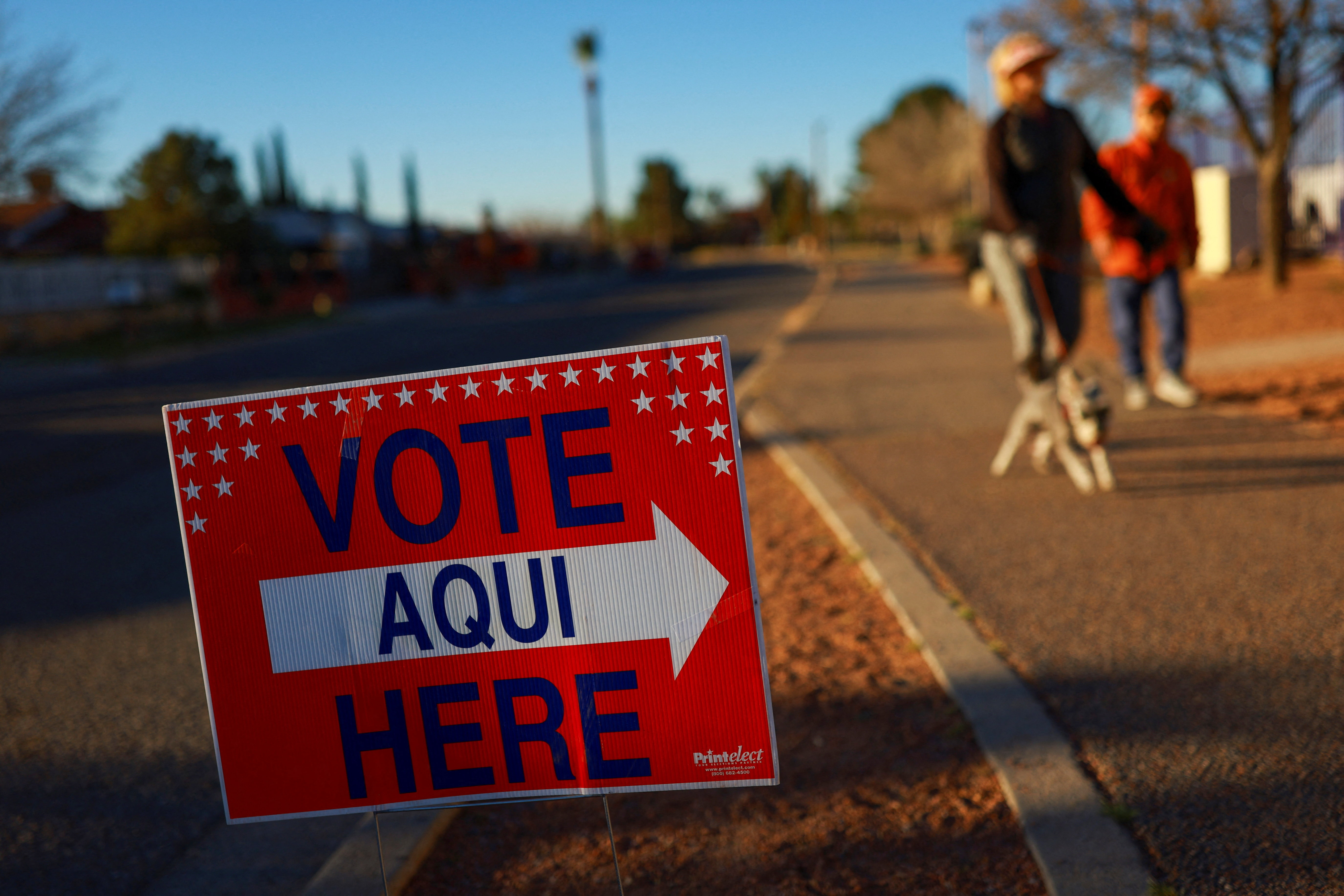 A “Vote Here” sign is displayed outside a polling station during a primary election to choose candidates for the November midterm elections, in El Paso, Texas, U.S., March 3, 2026. REUTERS/Jose Luis Gonzalez