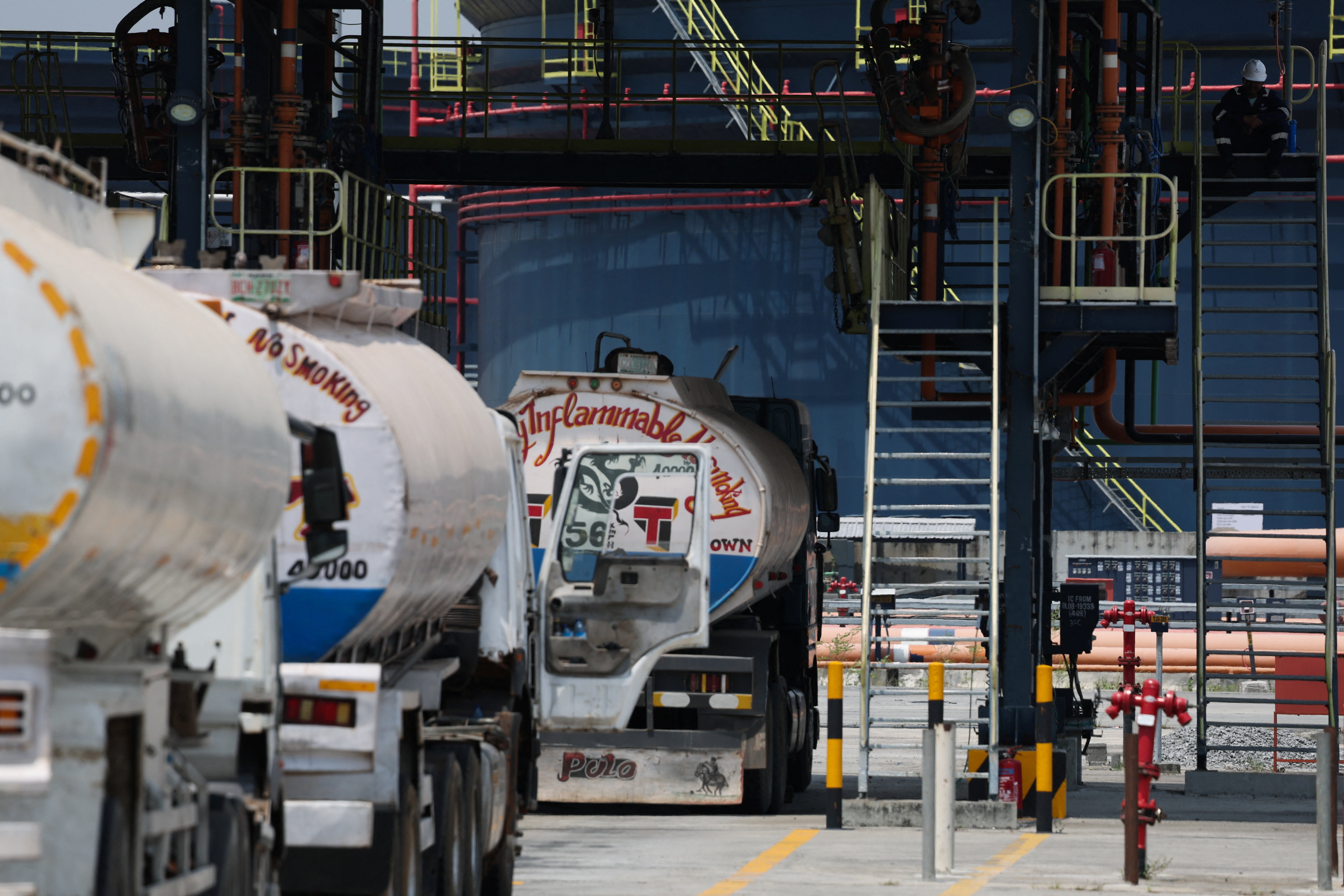 Petroleum trucks line up at the gantry inside the Dangote Industries oil refinery and fertiliser plant site in the Ibeju Lekki district of Lagos, Nigeria, March 2, 2026