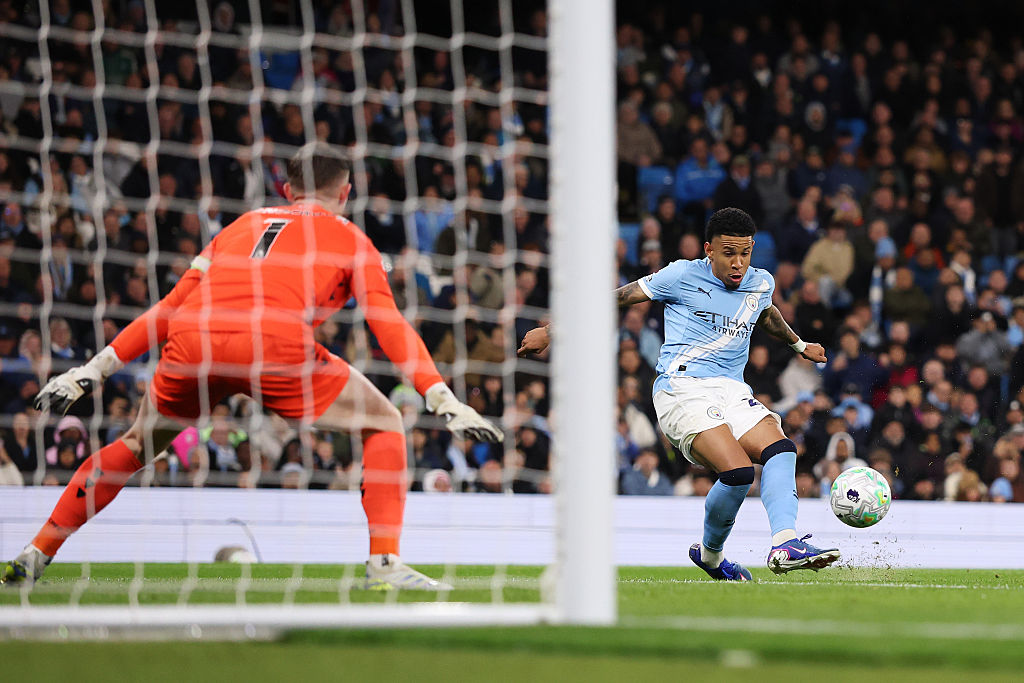 Savinho of Manchester City scores his team's third goal during the Premier League match