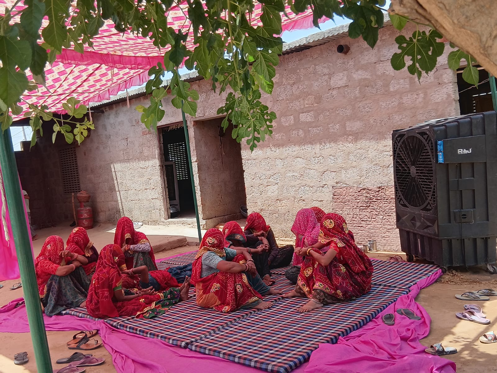 Women mourning outside Pradeep’s family home in Jhunjhunu, Rajasthan, in western India [Courtesy of Pradeep’s family]