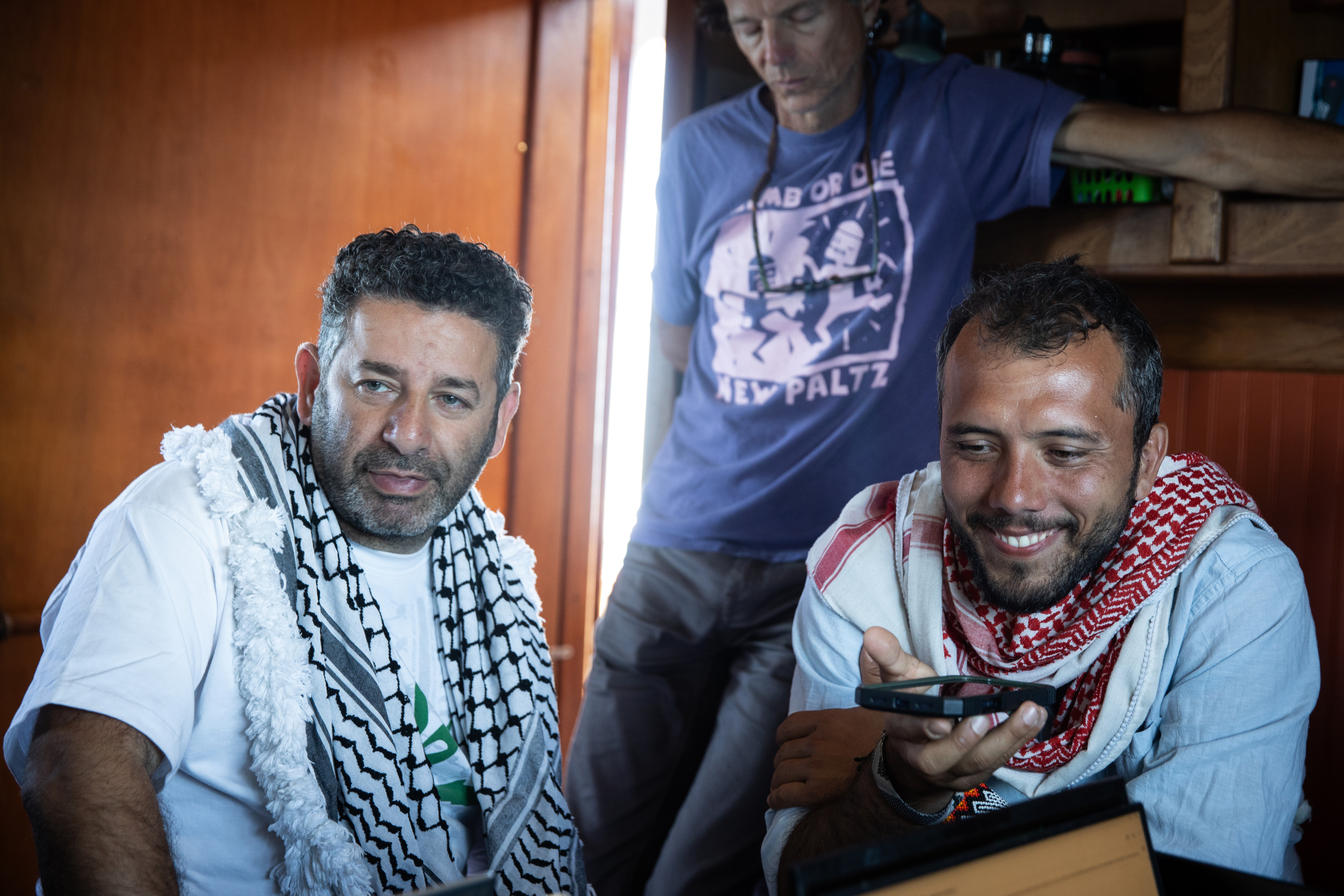 Saif Abukeshek, a Palestinian-Spanish activist and member of the Global Sumud Flotilla’s steering committee, left, and Thiago Ávila, a Brazilian activist and member of the Global Sumud Flotilla’s steering committee, aboard the Greenpeace vessel Arctic Sunrise, which joined a Gaza-bound flotilla in the Mediterranean Sea on April 18, 2026. (Max Cavallari/Greenpeace via AP)
