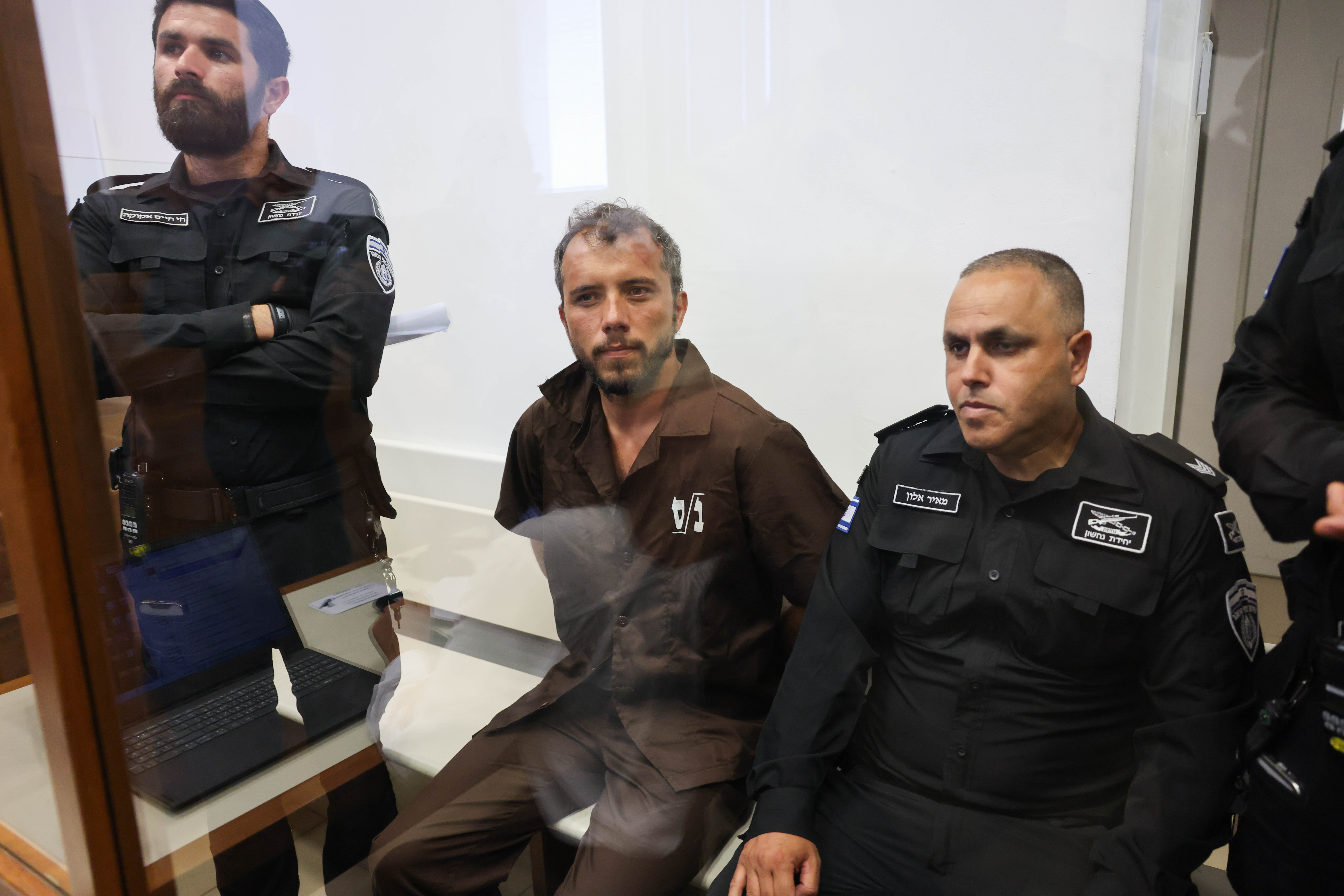 epa12929418 Thiago Avila (C), a member of the Global Sumud Flotilla, arrives to attend his trial for a remand extension at the Ashkelon Magistrate's Court in Ashkelon, Israel, 03 May 2026. Thiago Avila along with Abu Keshek were arrested on 02 May off the island of Crete, according to the organization. According to the Israeli Ministry of Foreign Affairs, Abu Keshek is suspected of affiliation with a terrorist organization, and Avila of illegal activity. EPA/ABIR SULTAN