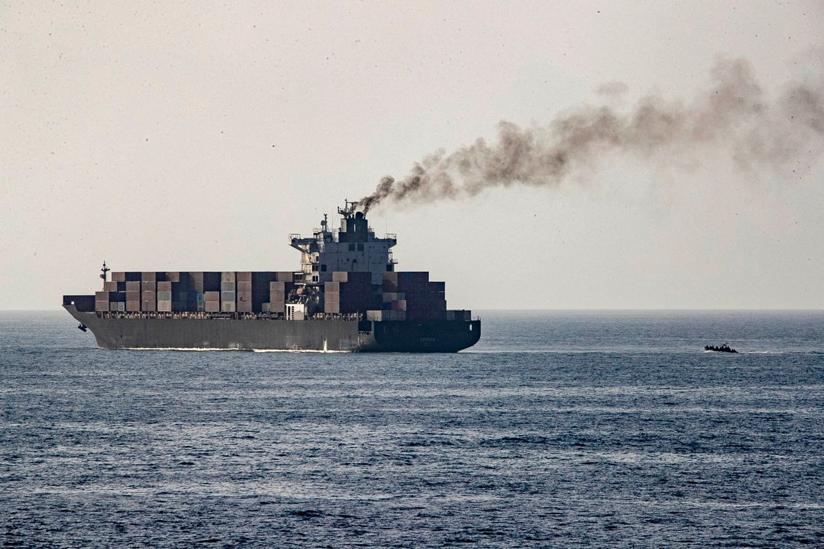 U.S forces patrol near the Iranian-flagged cargo ship M/V Touska after it was boarded and seized by U.S. forces on Sunday, at a location given as the Arabian Sea, in this handout image released April 20, 2026. U.S. Central Command via X/Handout via REUTERS THIS IMAGE HAS BEEN SUPPLIED BY A THIRD PARTY. MANDATORY CREDIT. BEST QUALITY AVAILABLE. VERIFICATION: Location and date could not be verified No earlier versions of the images were found posted online before April 20 Reuters was able to identify Iranian-flagged container ship Touska from the deck layout, mast, and superstructure of the ship that matched file images
