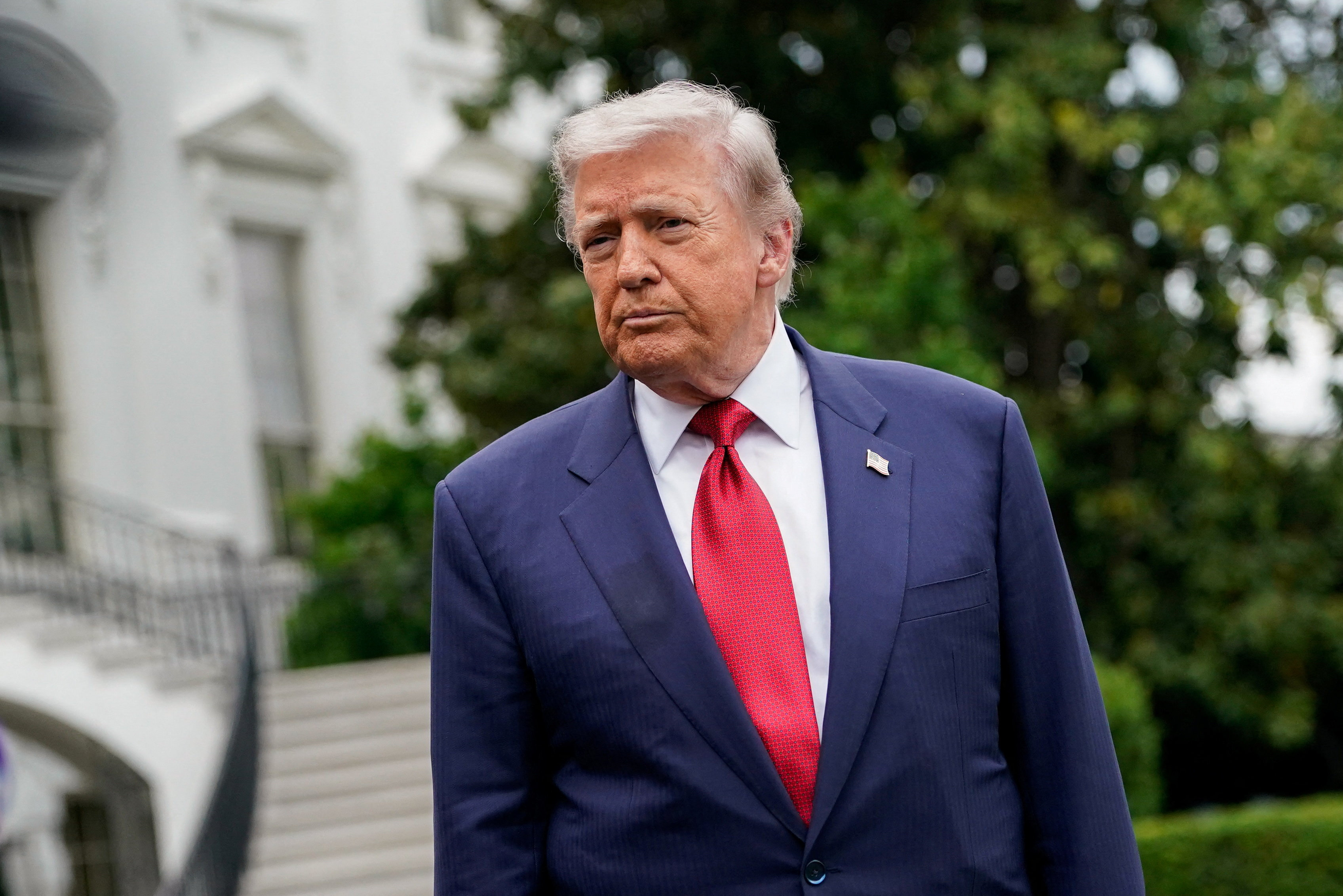 U.S. President Donald Trump listens to reporters at the White House in Washington, D.C., U.S., May 8, 2026. REUTERS/Elizabeth Frantz