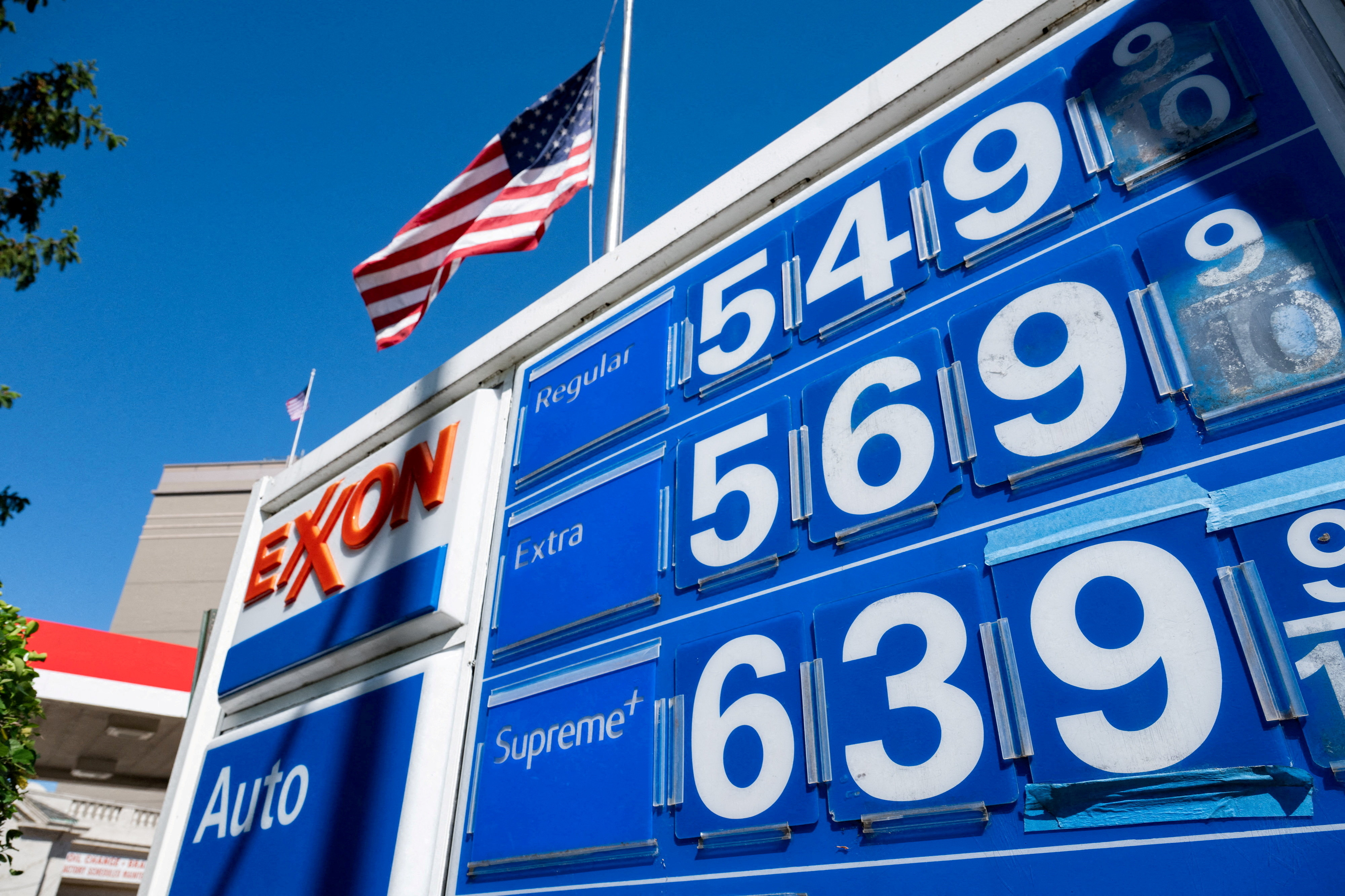 FILE PHOTO: A gas station sign displays prices in Washington, D.C., U.S., May 1, 2026. REUTERS/Annabelle Gordon/File Photo