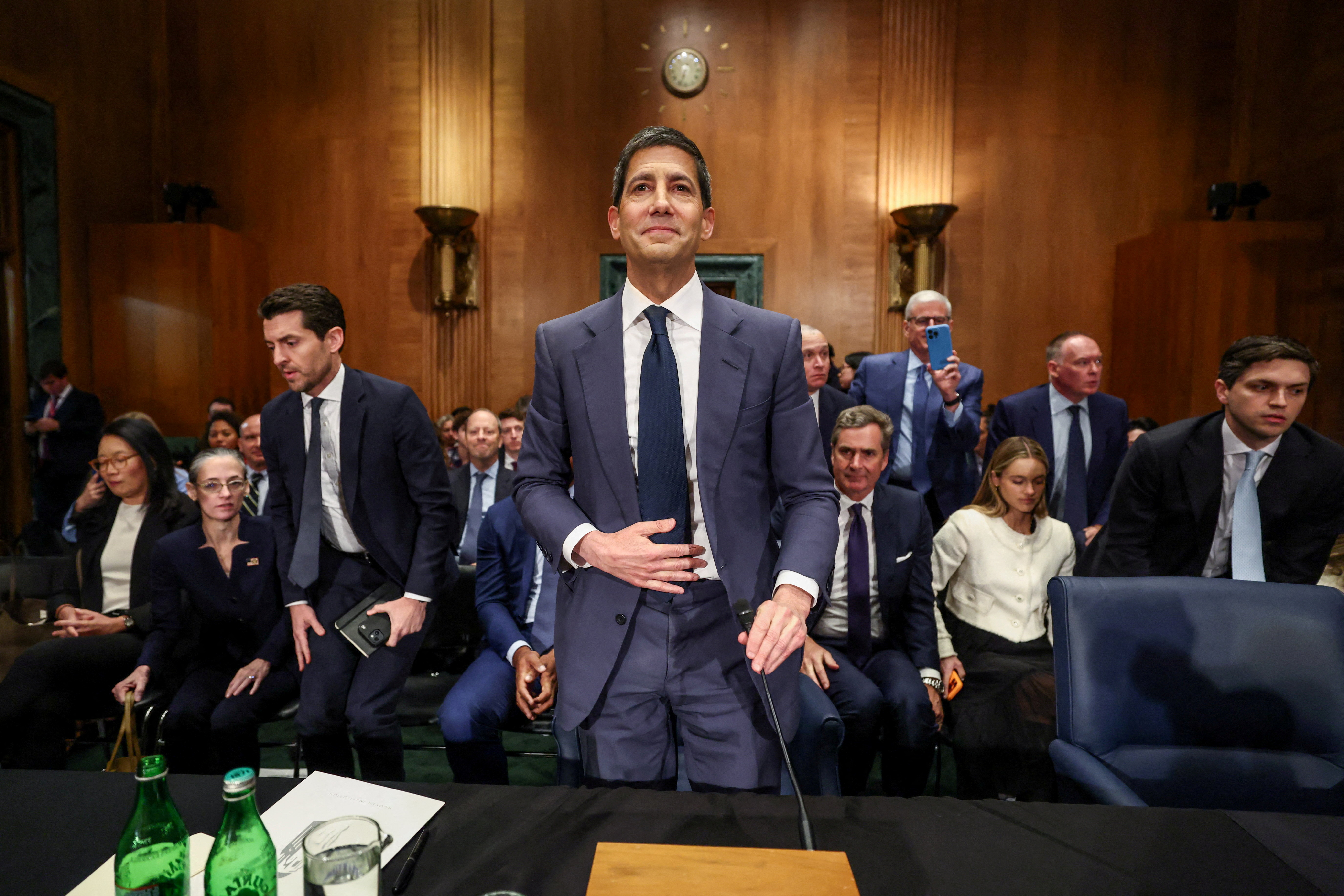 FILE PHOTO: Kevin Warsh, U.S. President Donald Trump's nominee to be next chair of the Federal Reserve, at the end of a Senate Banking Committee confirmation hearing on Capitol Hill in Washington, D.C., U.S., April 21, 2026. REUTERS/Kevin Lamarque/File Photo