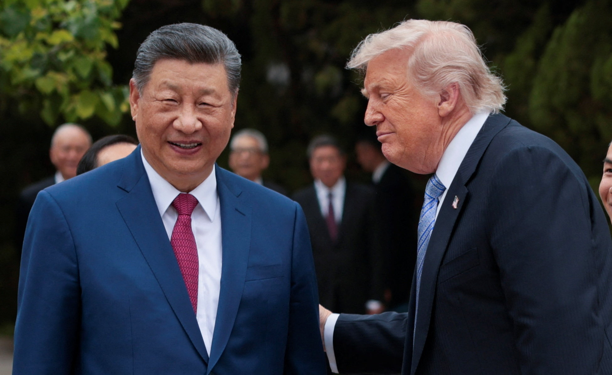 U.S. President Donald Trump speaks with Chinese President Xi Jinping while leaving after a visit to the Zhongnanhai Garden in Beijing, China, May 15, 2026. REUTERS/Evan Vucci/Pool