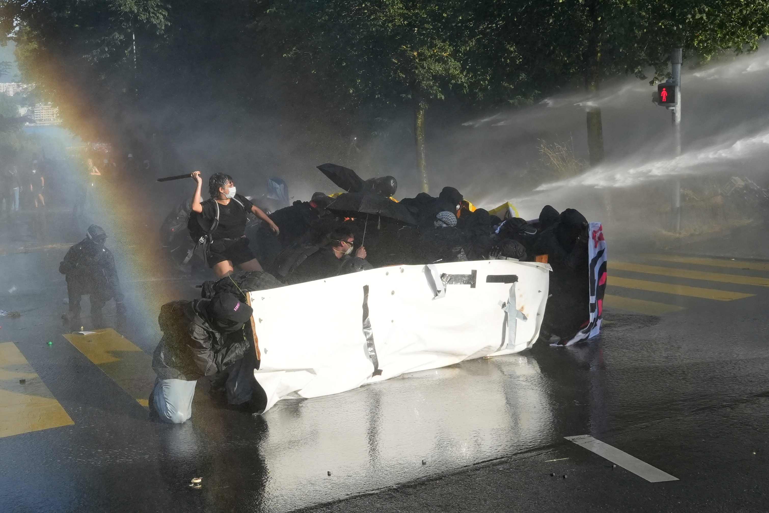 Geneva police use force as G7 protest escalates into violence