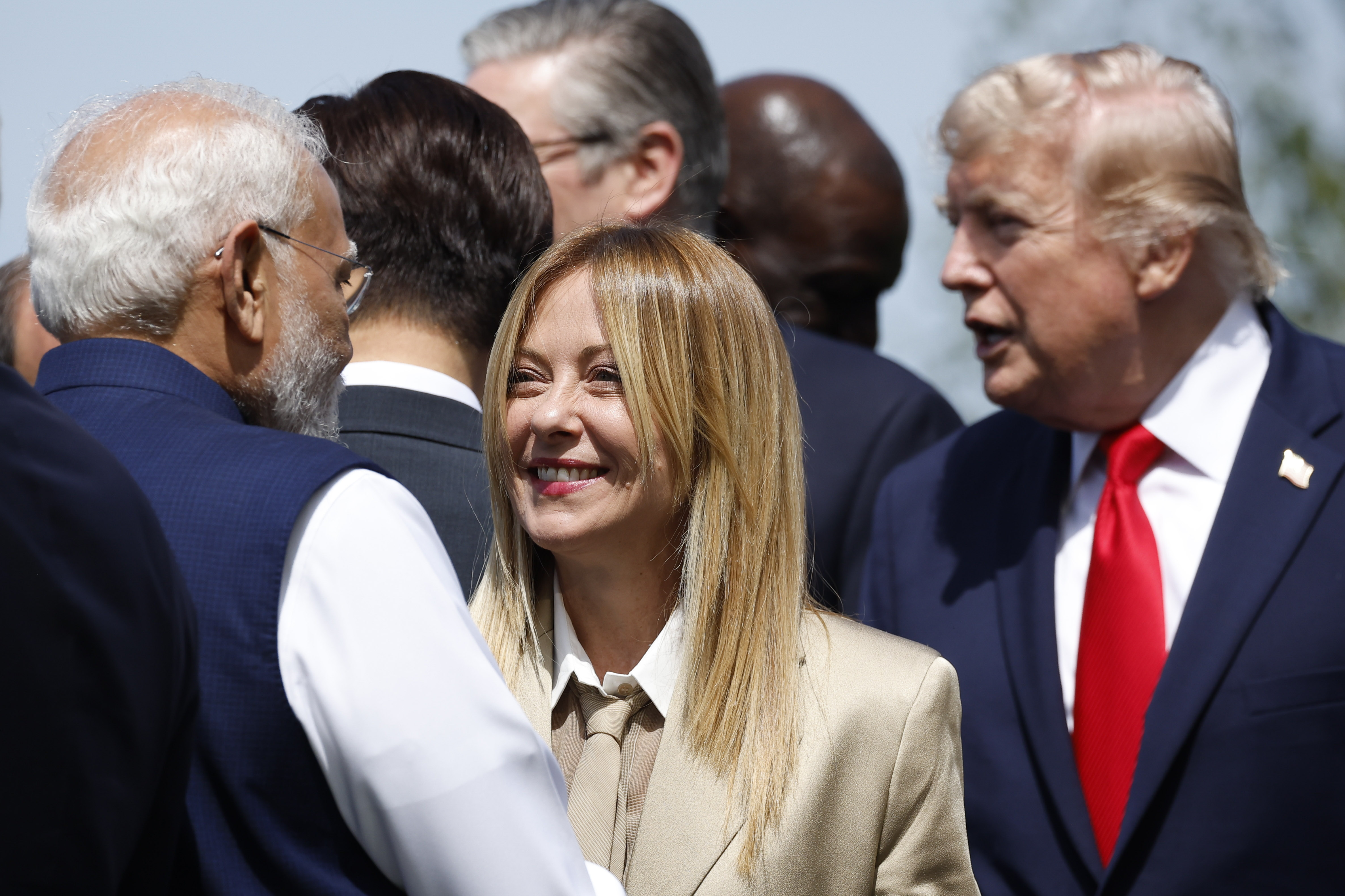 epa13041239 Italy's Prime Minister Giorgia Meloni (C) chats with Prime Minister of India Narendra Modi (L), next to US President Donald Trump (R) at Hotel Royal during the G7 Summit in Evian-les-Bains, France, 16 June 2026. The 52nd G7 Summit takes place in Evian-les-Bains from 15 to 17 June 2026. EPA/YOAN VALAT