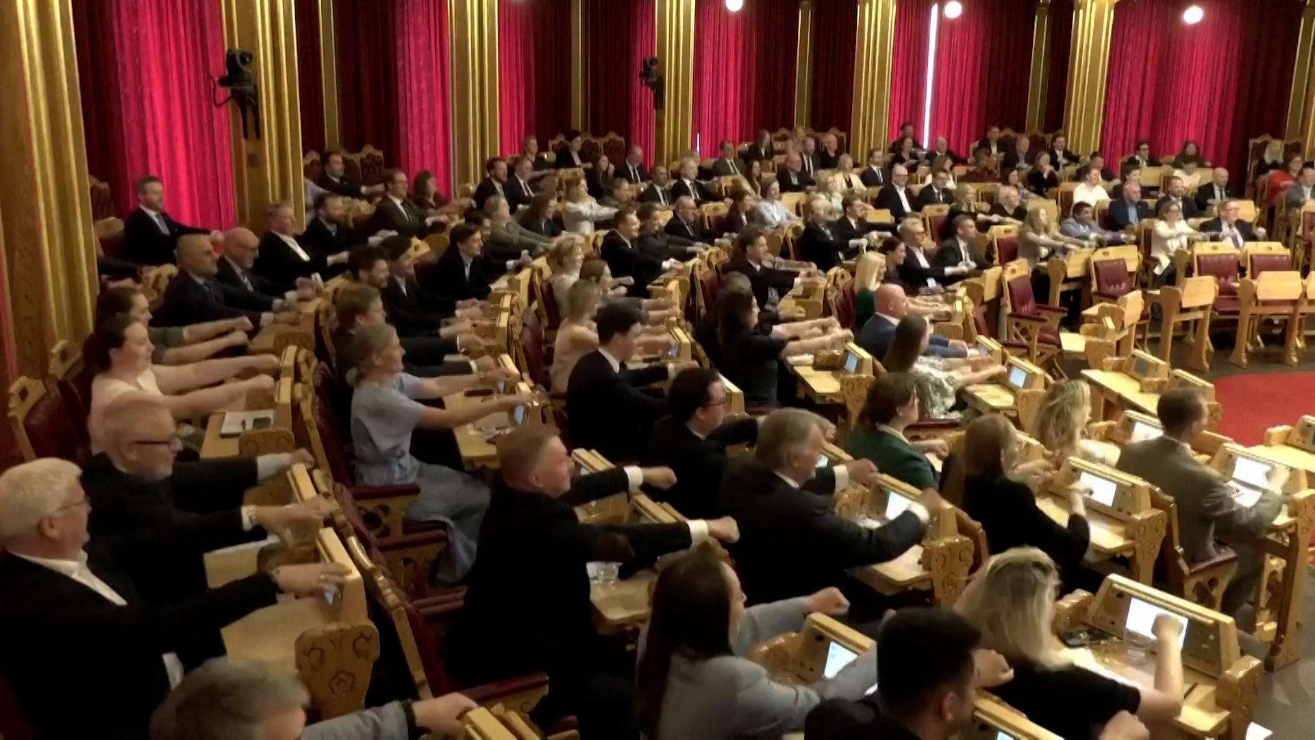 Norwegian lawmakers perform 'Viking Row' in parliament to support footballers [Reuters]