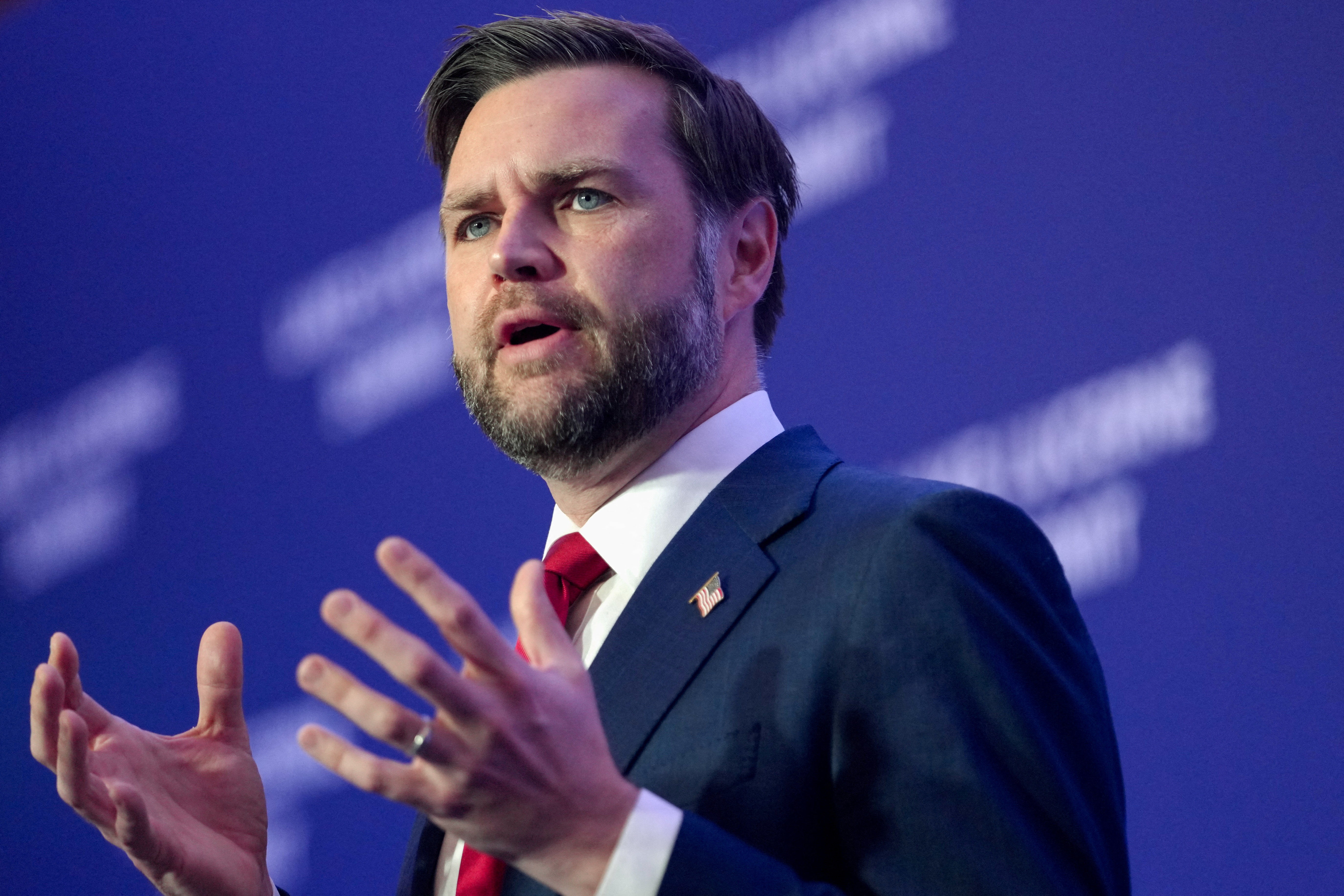 U.S. Vice President JD Vance speaks to members of the media before boarding Air Force Two, after the U.S. and Iran held high-level talks at the Lake Lucerne Summit, at Emmen Military Air Base, Emmen, Switzerland, June 22, 2026. REUTERS/Nathan Howard/Pool
