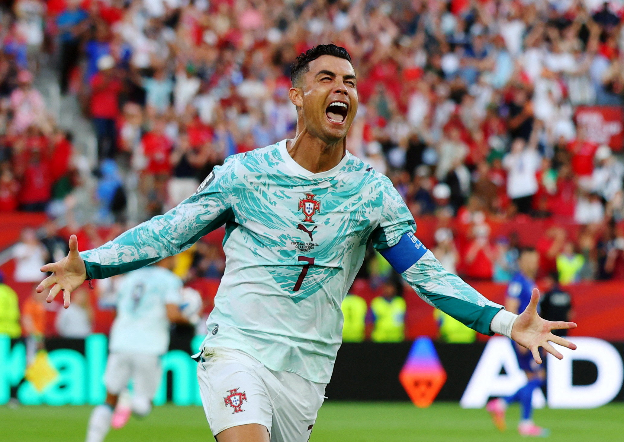 Portugal's Cristiano Ronaldo celebrates scoring their first goal