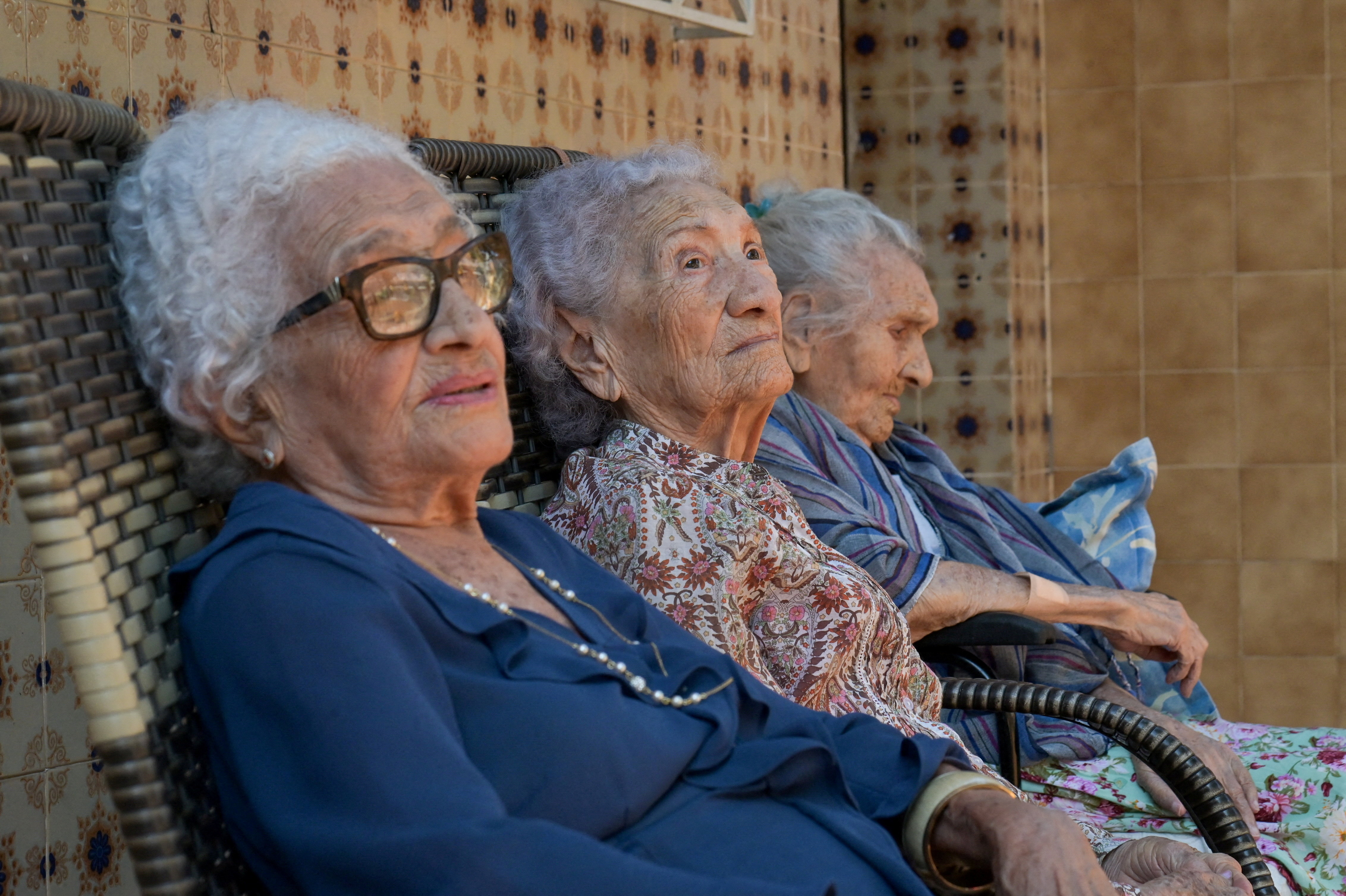 Zoraide de Deus Mota, 104, Zulina de Deus Nunes, 103, and Levita de Deus Nunes, 109, recognized as the world's oldest living trio of sisters, attend an interview with Reuters in Rio de Janeiro, Brazil, June 23, 2026. Recently named the world's oldest living siblings, the sisters are part of a study that aims to identify genetic factors linked to longevity. REUTERS/Tita Barros