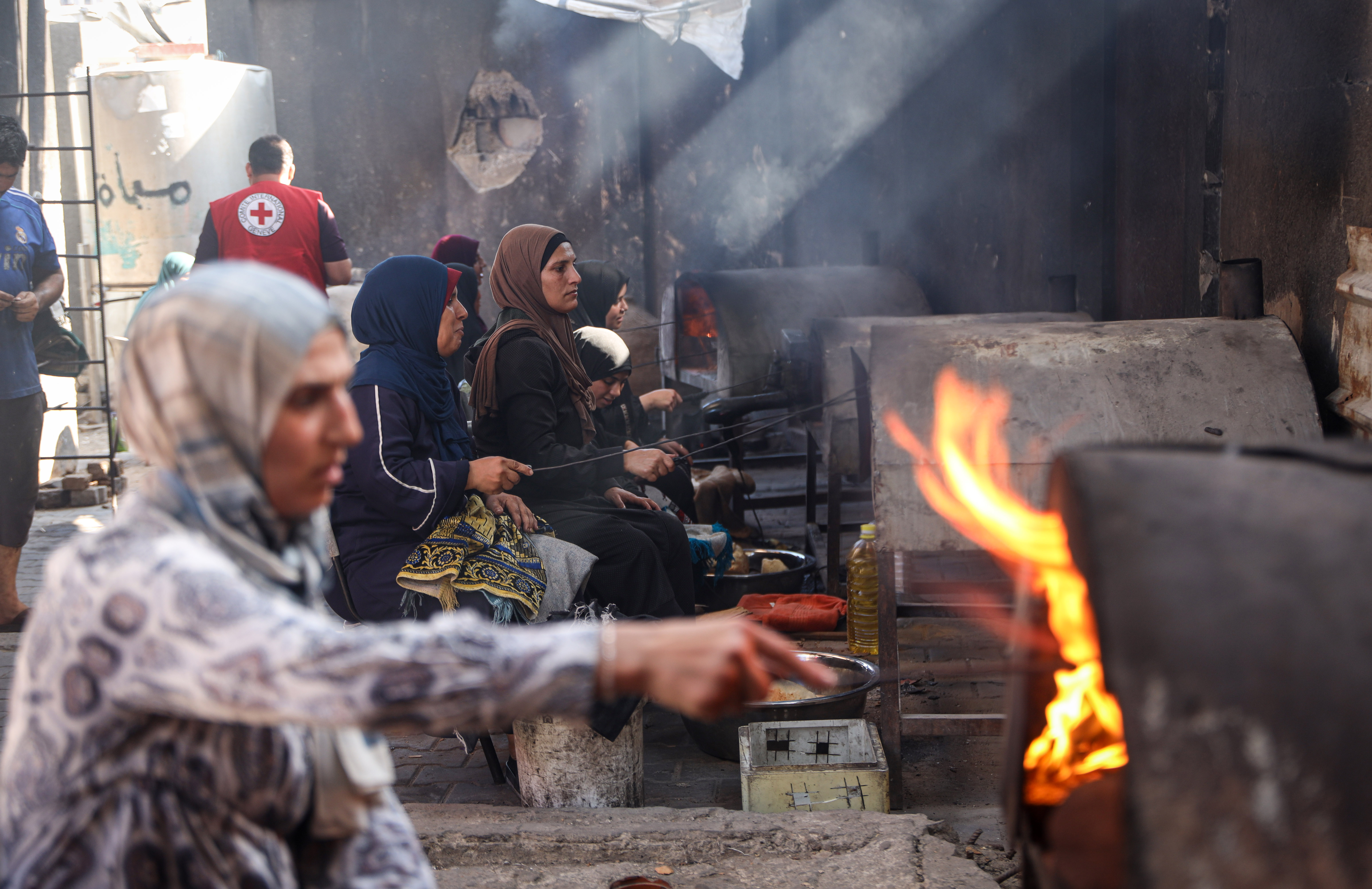 Displaced women turn to communal ovens to bake bread as the cost of cooking fuel and firewood continues to rise, sometimes costing more than the food itself  