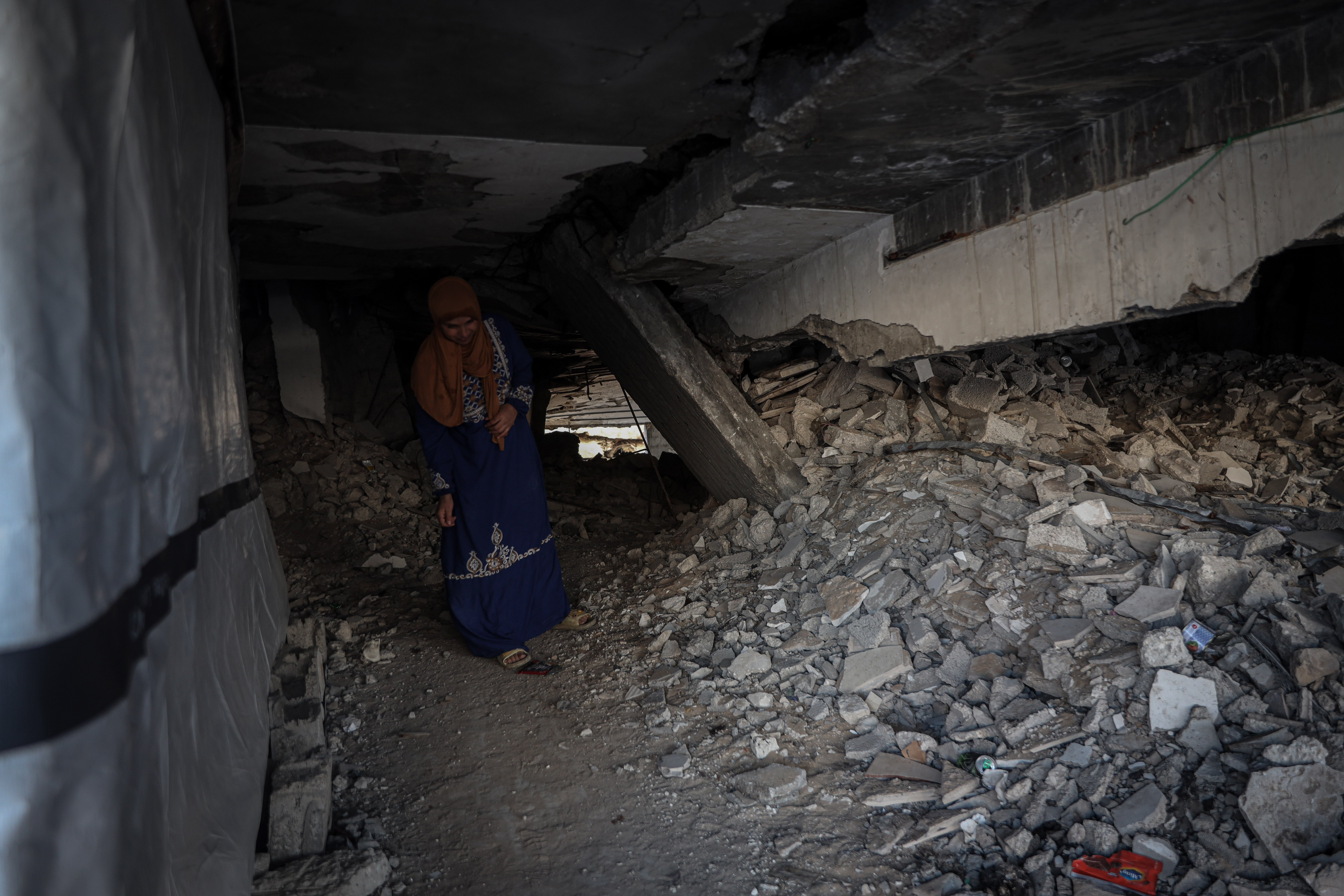 Islam Hassanein is particularly worried about how weather conditions in the winter will affect the partially collapsed building she lives in