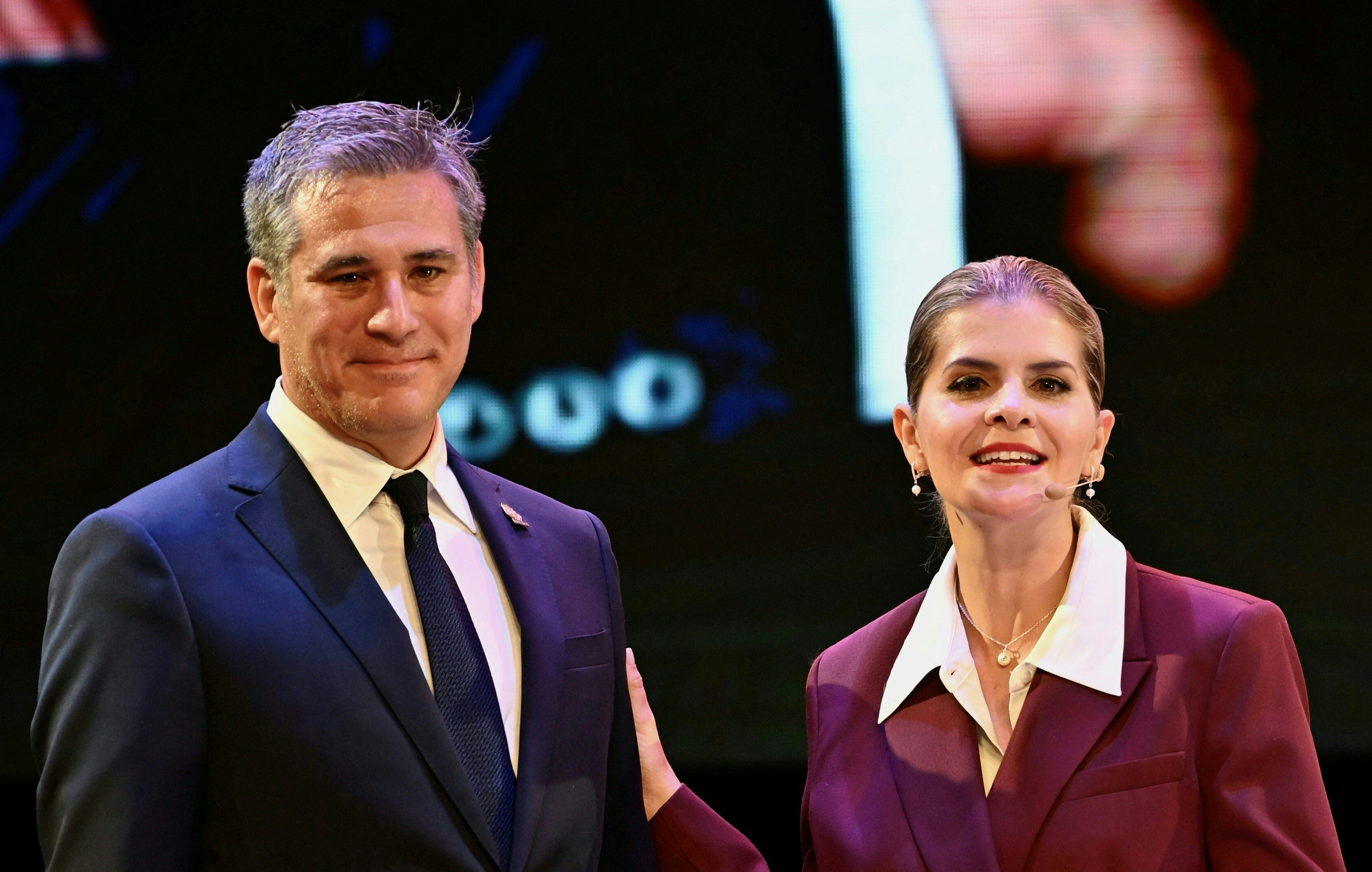 (FILES) Costa Rica’s president-elect Laura Fernandez (R) introduces the new foreign minister, Manuel Tovar (L), in San Jose on May 5, 2026.