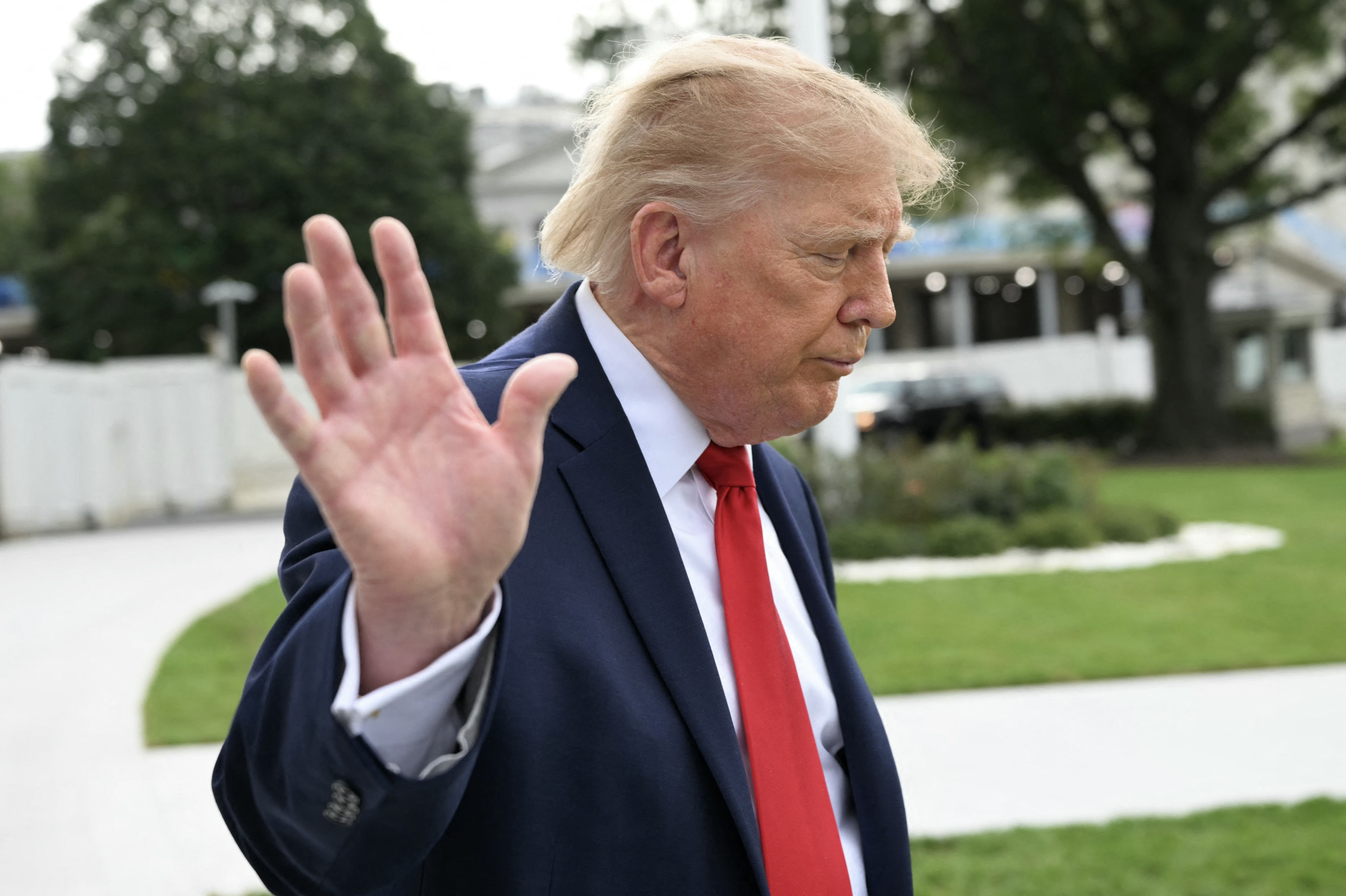 US President Donald Trump waves as he walks to board Marine One as he departs from the South Lawn of the White House in Washington, DC, on September 26, 2026.